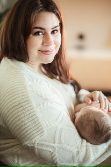 Indoor lifestyle family photography session with mother and newborn in Omaha, Nebraska