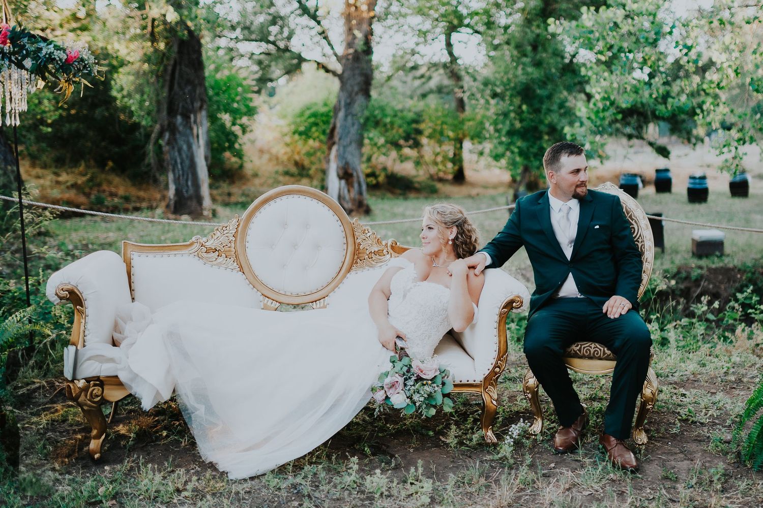 Romantic wedding photography session in a natural outdoor setting.