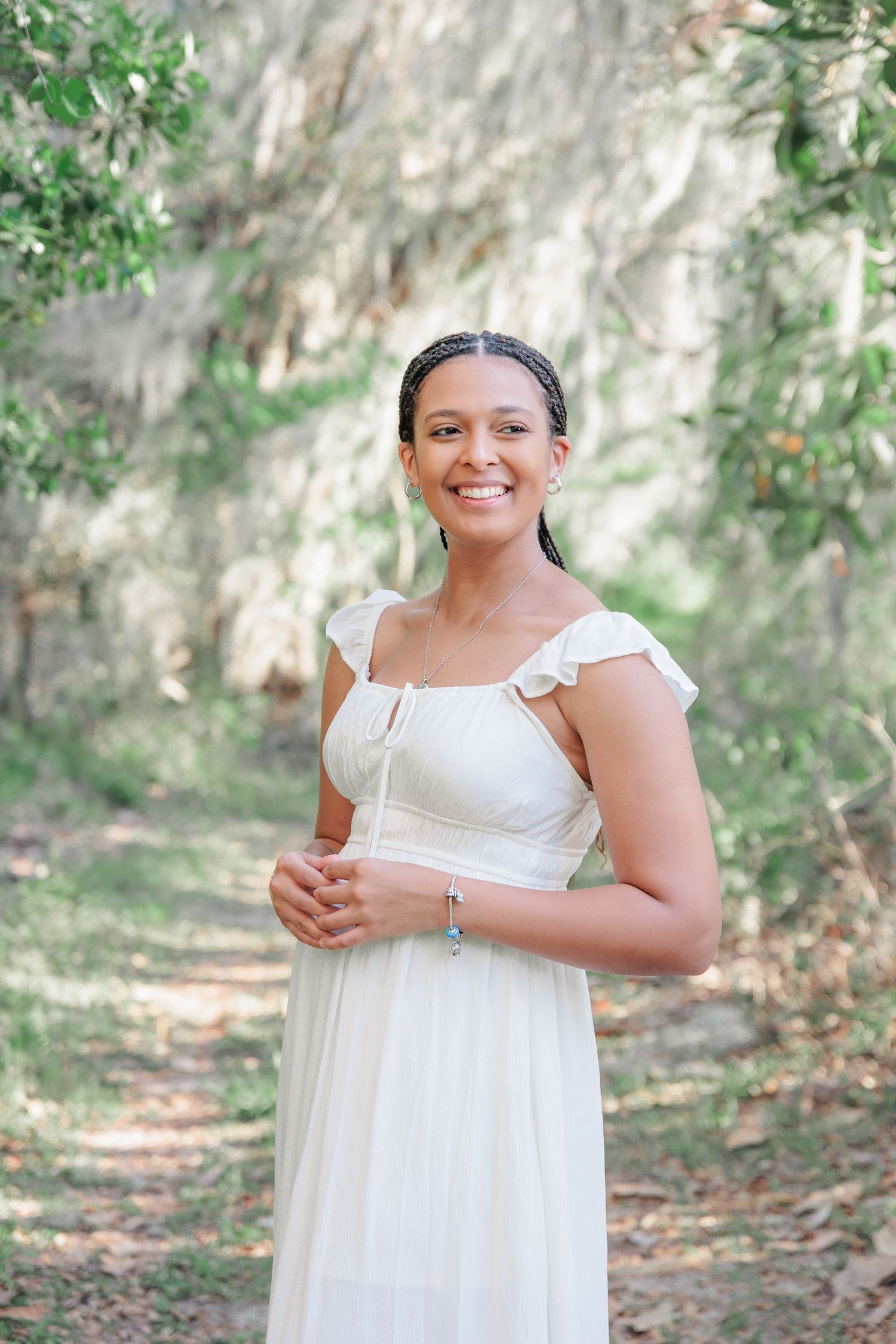 Fun, authentic senior portrait of a high school girl in casual outfits showcasing her personality in Valdosta, GA.