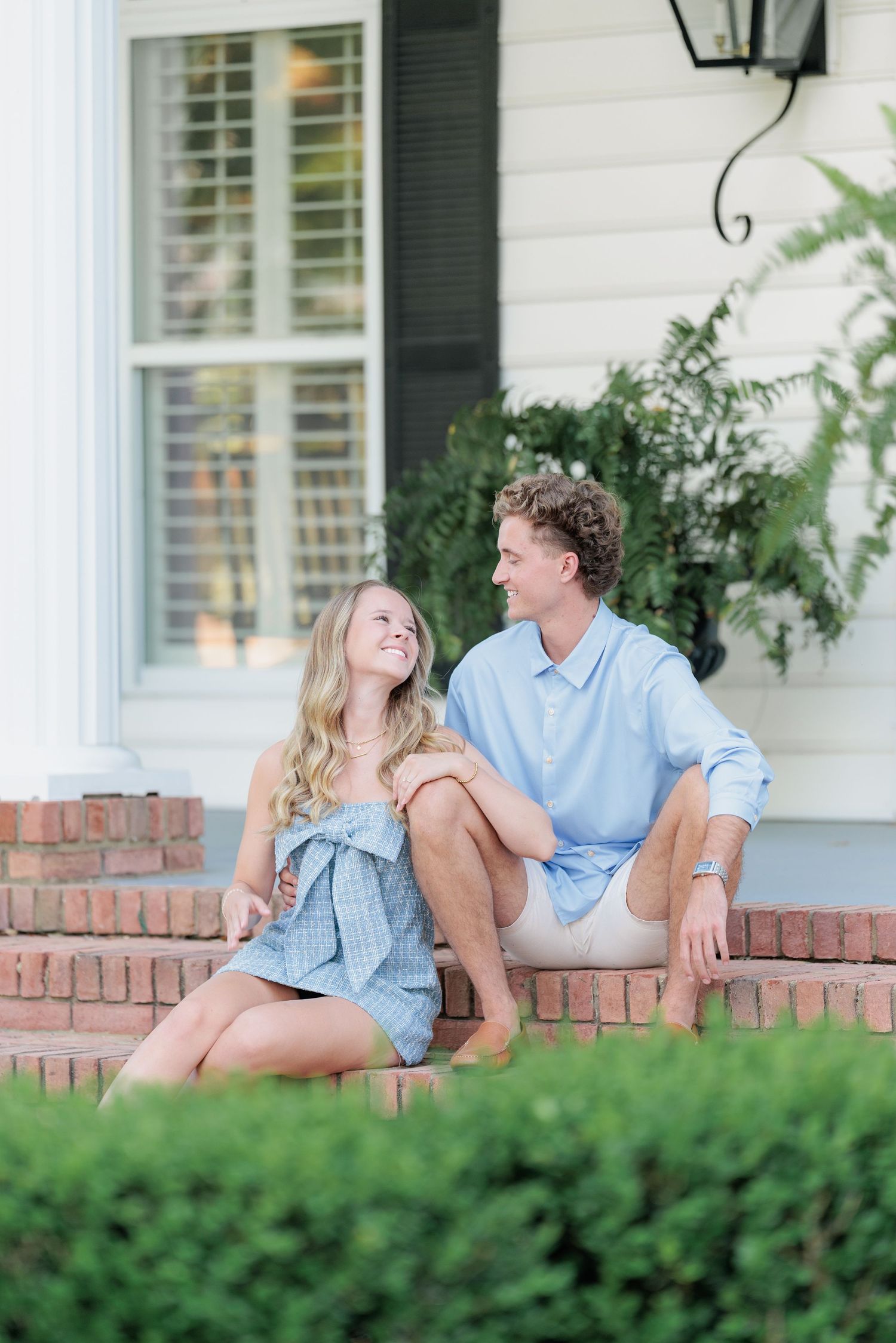 Authentic, joyful engagement portrait of a couple laughing together during an engagement session with photographer based in Valdosta, GA.