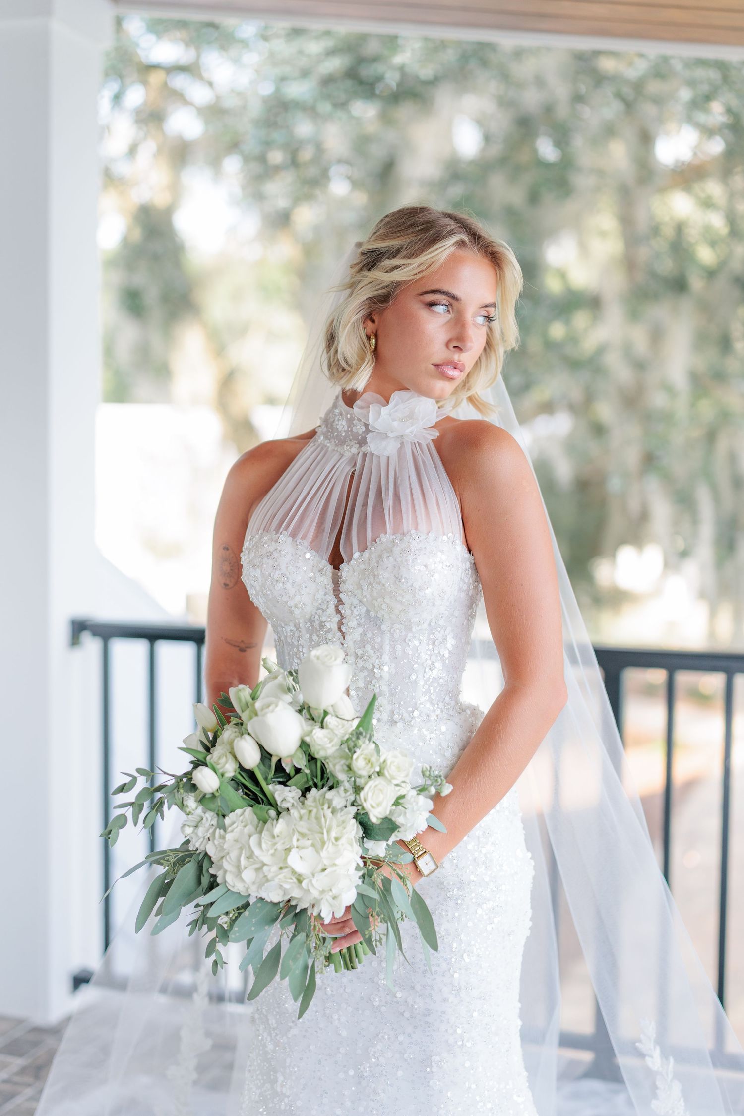 Elegant bridal portrait highlighting the bridal details of the wedding dress at a beautiful with a photographer based in South Georgia.