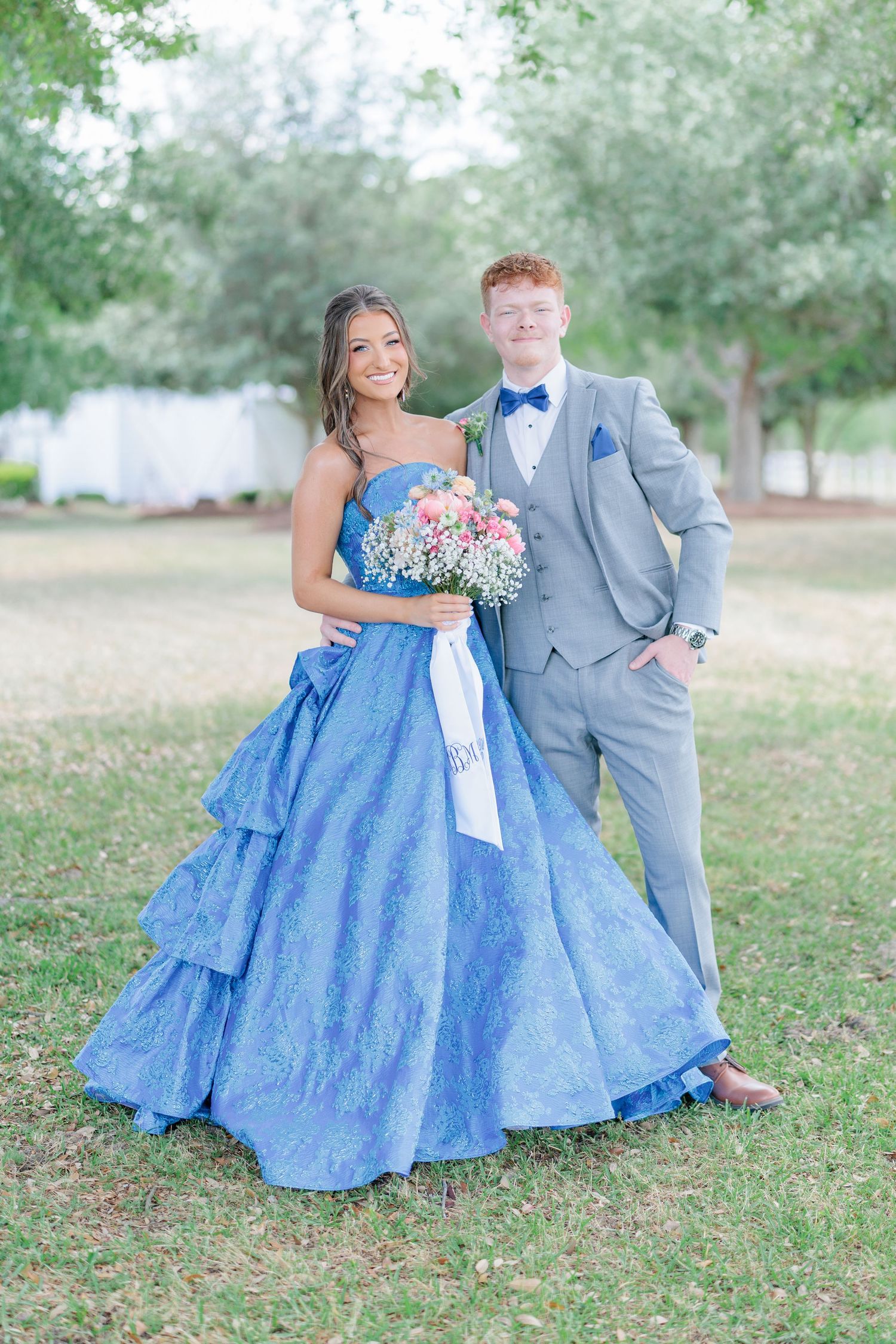 Elegant prom couple portrait of high school students dressed up in formalwear before prom, taken by a photographer based in Valdosta, GA,