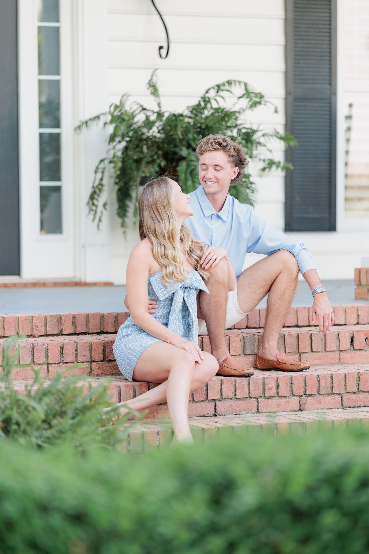 Authentic, joyful engagement portrait of a couple laughing together during an engagement session with photographer based in Valdosta, GA.