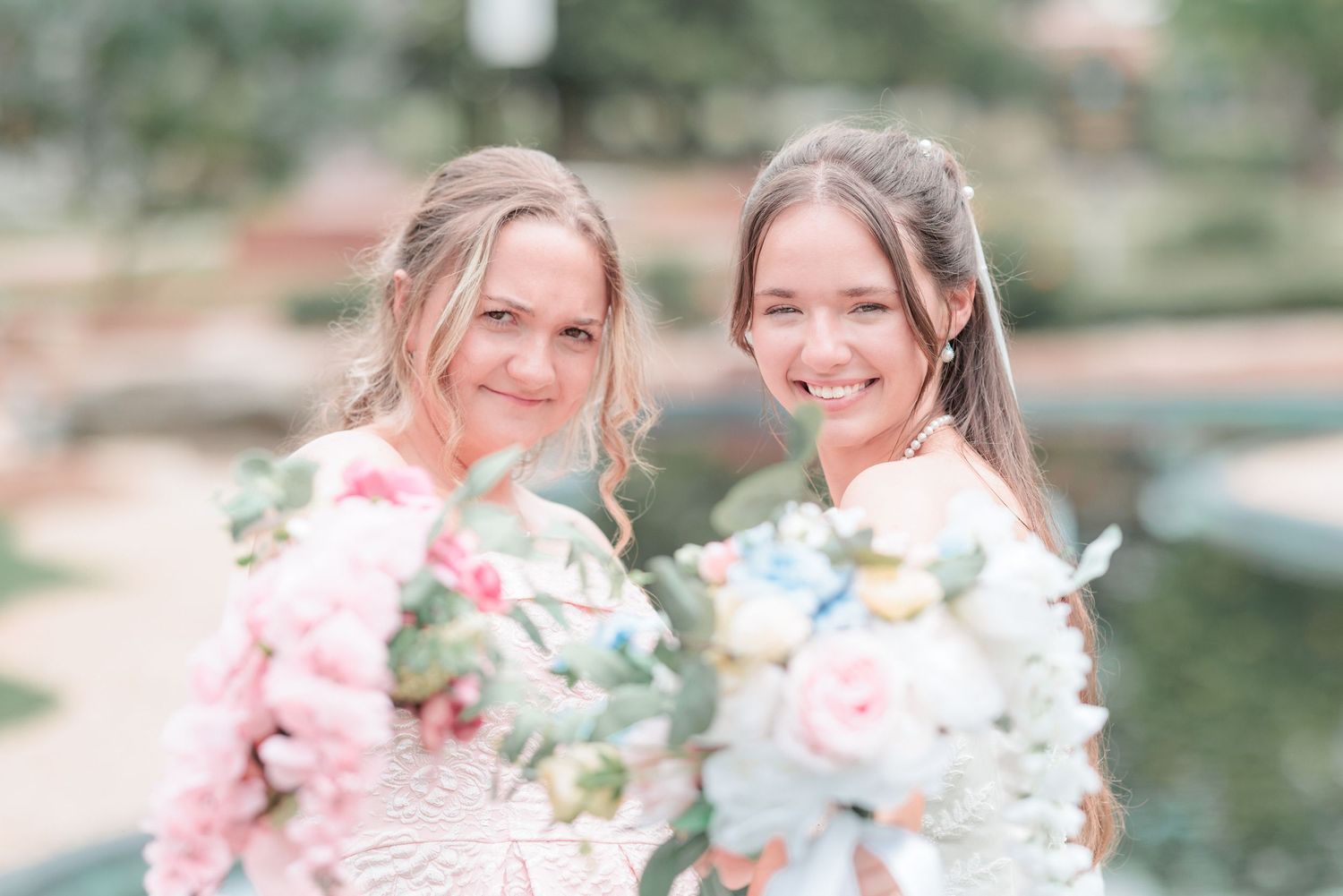 Fun, candid portrait of a bride, bridesmaids celebrating at a South Georgia wedding reception.