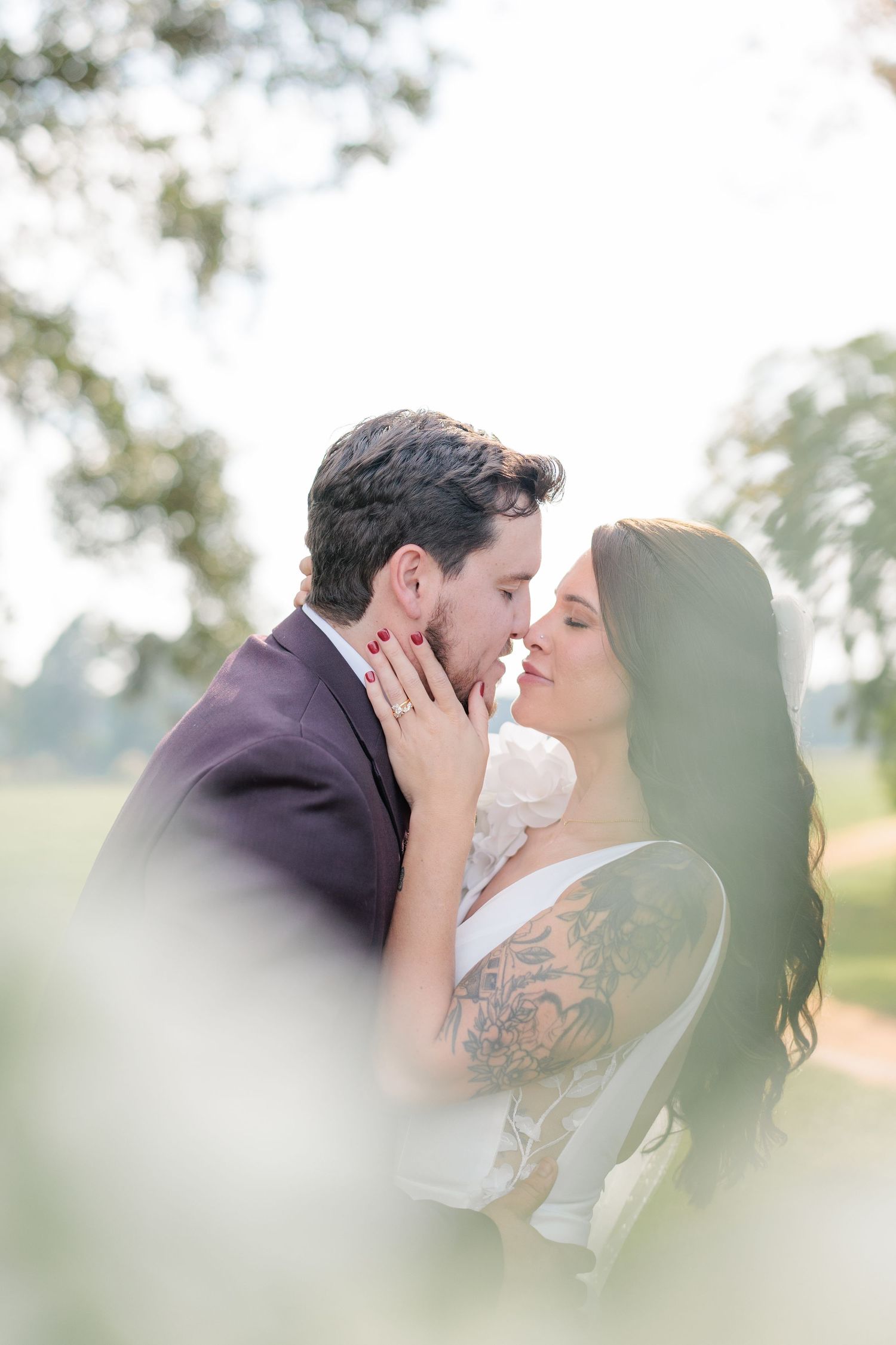 Portrait of a bride and groom embracing during a romantic couple's session during their wedding day in South Georgia.