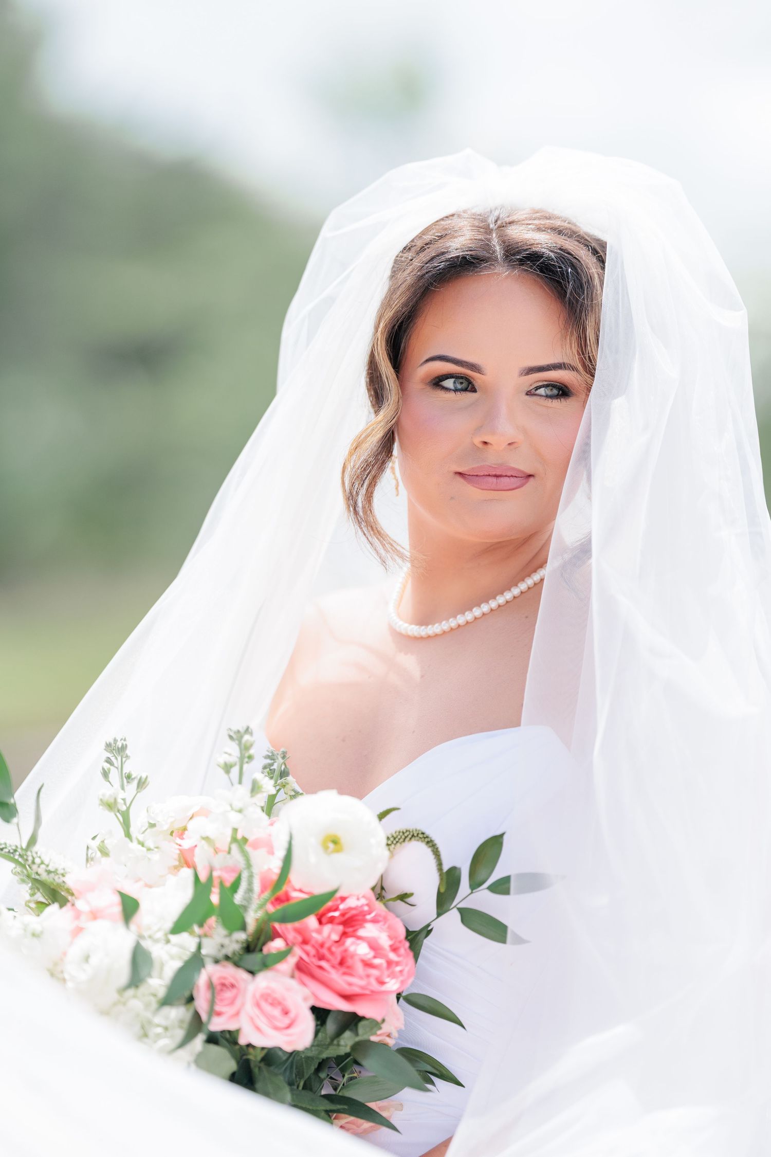 Elegant bridal portrait highlighting the bridal details of the wedding dress at a beautiful with a photographer based in South Georgia.