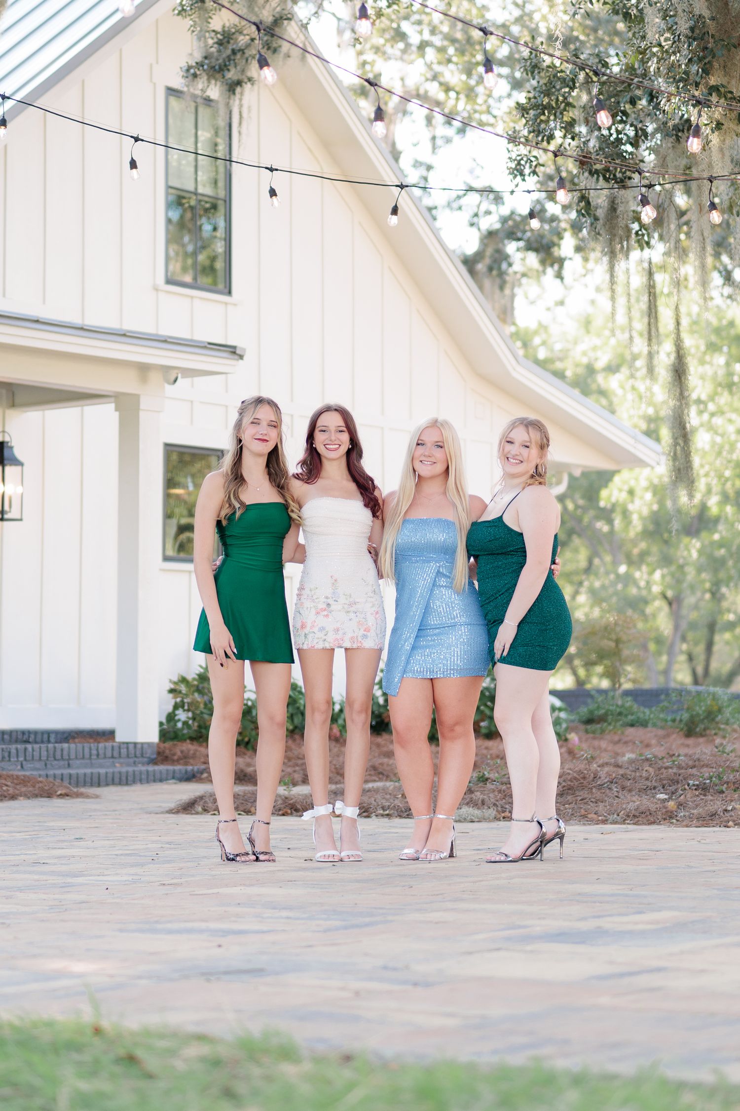 Fun and elegant portrait of a high school prom group dressed up in formalwear in the Valdosta South Georgia area.