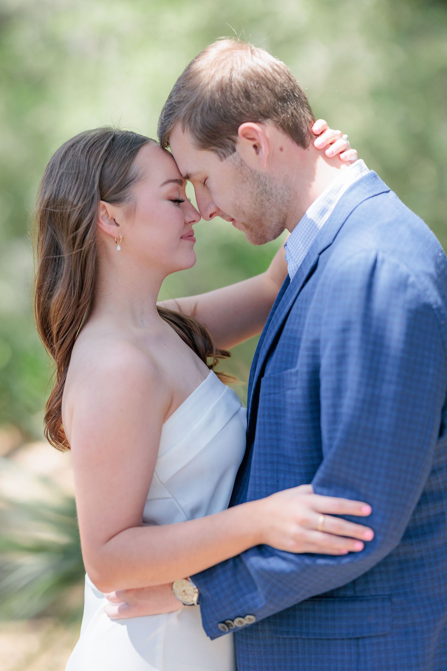 Authentic, joyful engagement portrait of a couple laughing together during an engagement session with photographer based in Valdosta, GA.