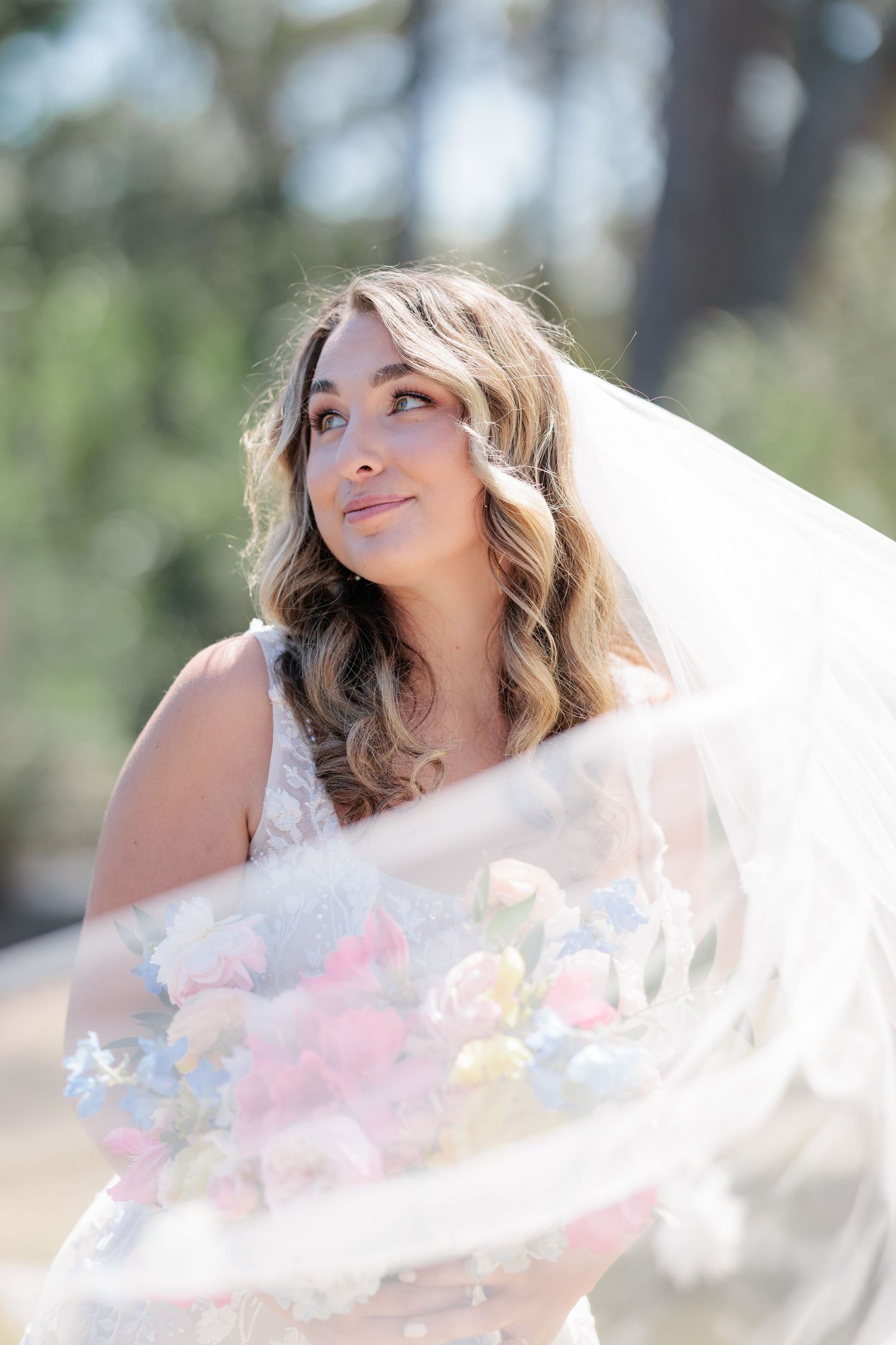 Elegant bridal portrait highlighting the lace details of the wedding dress taken by a South Georgia wedding photographer.
