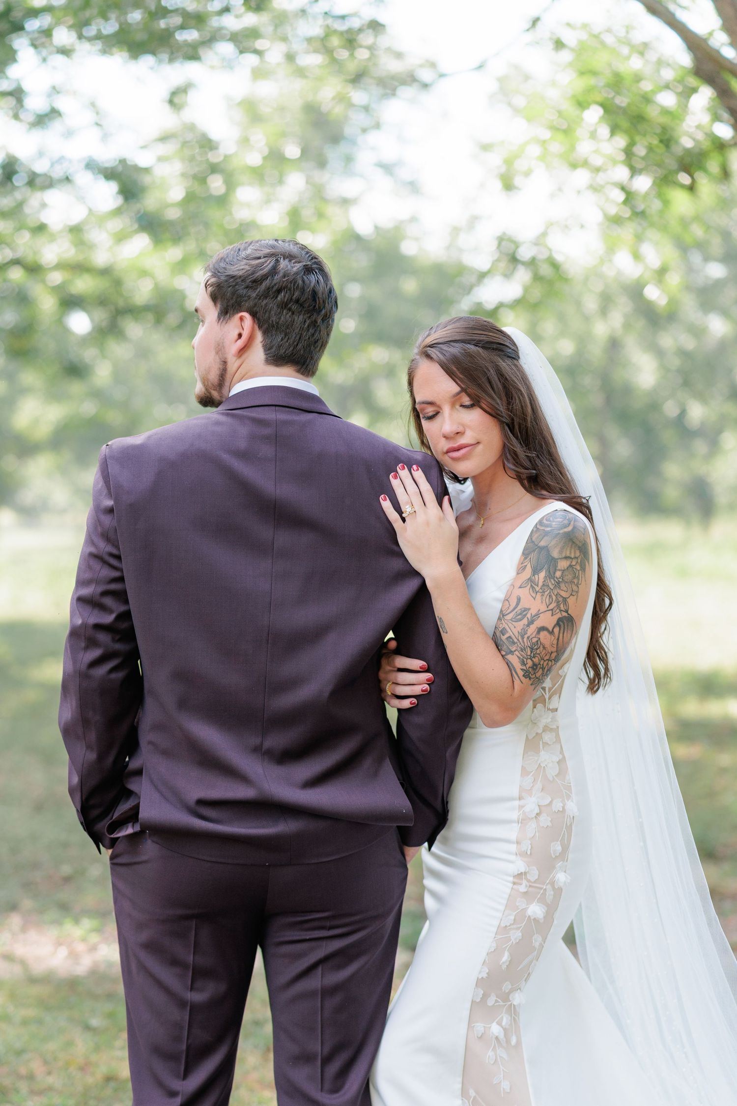 Portrait of a bride and groom embracing during a romantic couple's portrait session during their wedding day in South Georgia.