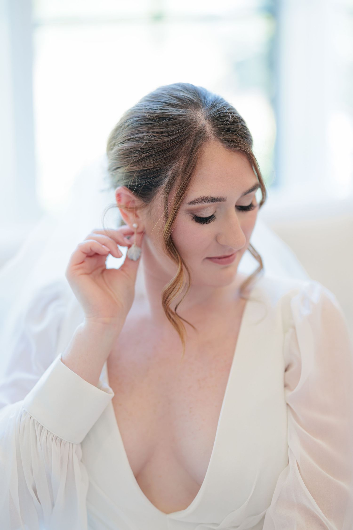 Elegant bridal portrait highlighting the bridal details of the wedding dress at a beautiful with a photographer based in South Georgia.