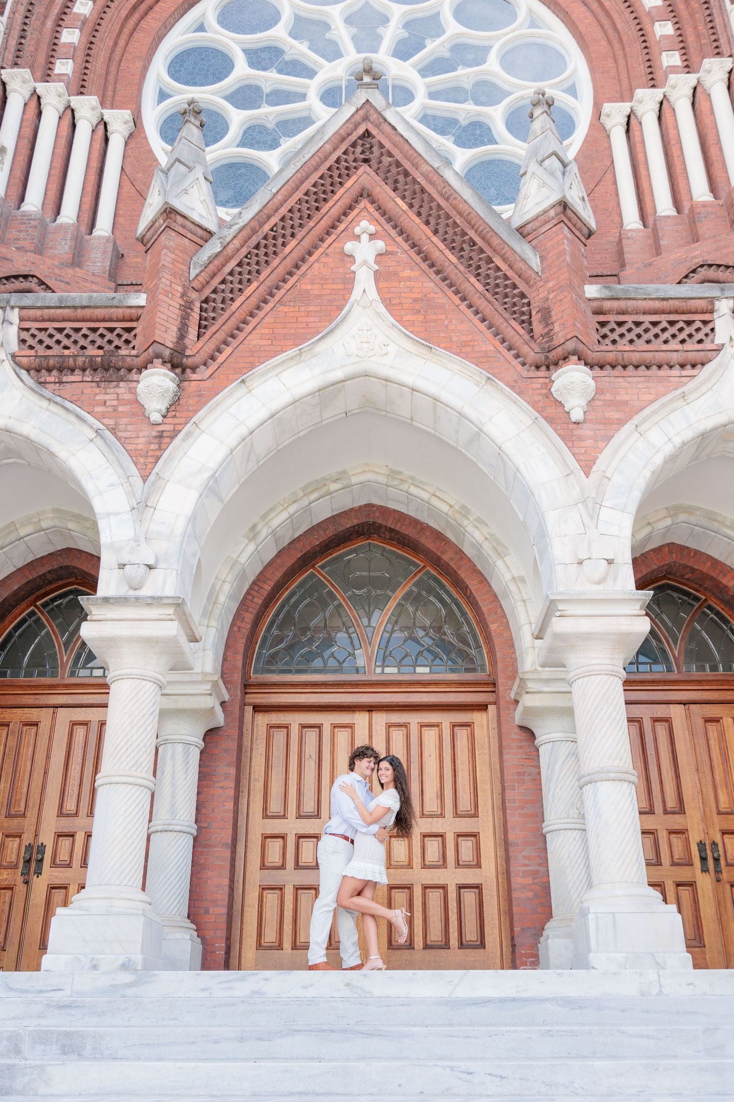 Authentic, joyful engagement portrait of a couple laughing together during an engagement session with photographer based in Valdosta, GA.
