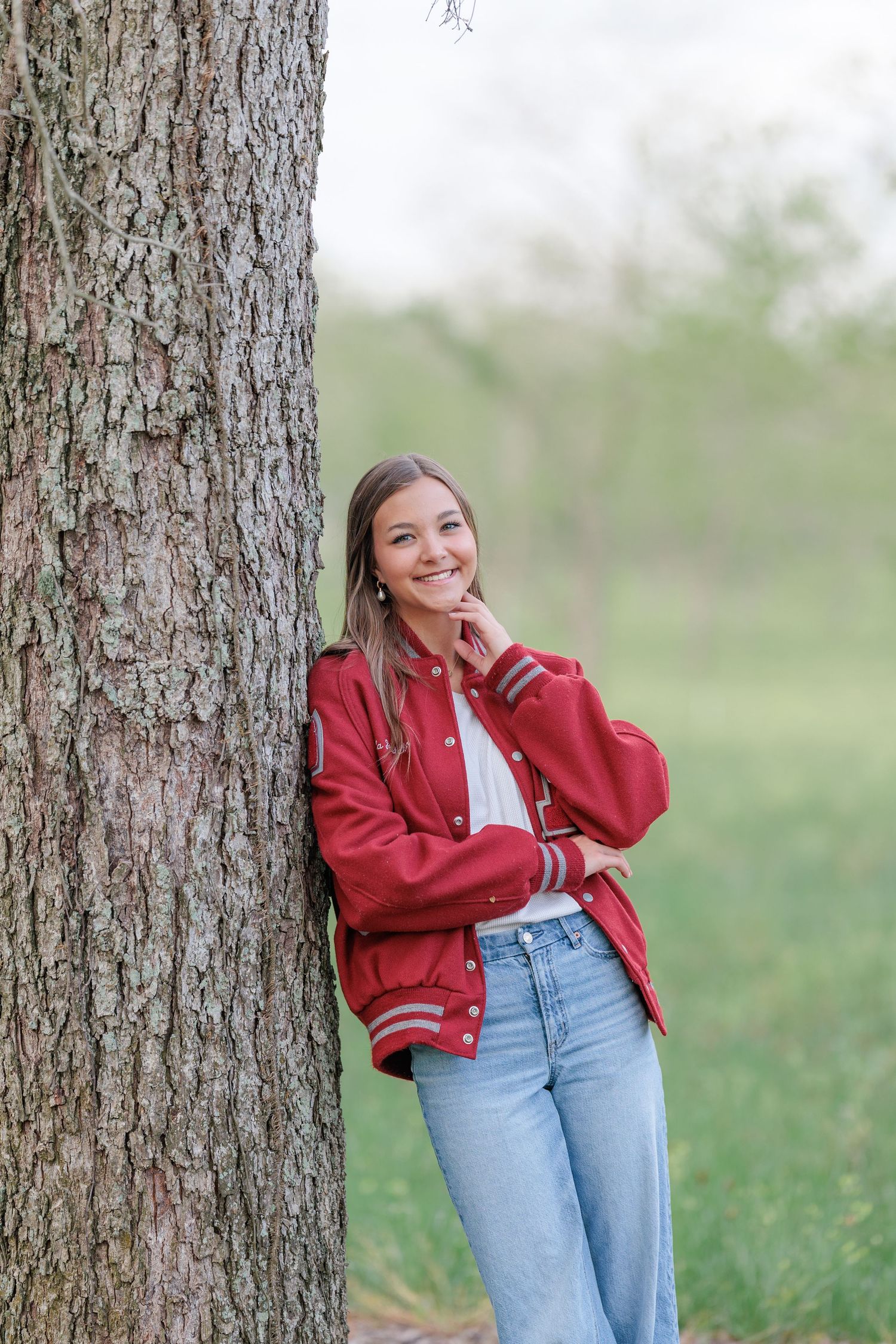 Fun, authentic senior portrait of a high school girl in casual outfits showcasing her personality in Valdosta, GA.