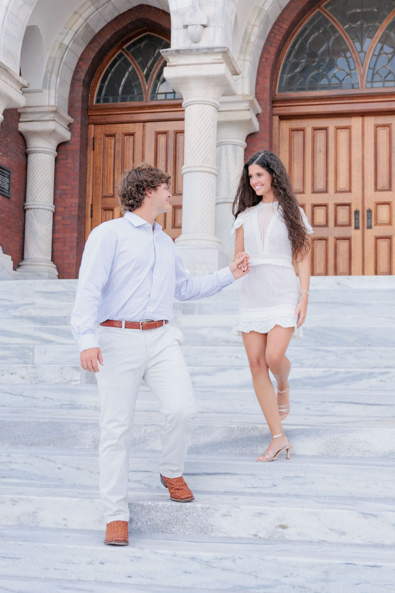 Authentic, joyful engagement portrait of a couple laughing together during an engagement session with photographer based in Valdosta, GA.