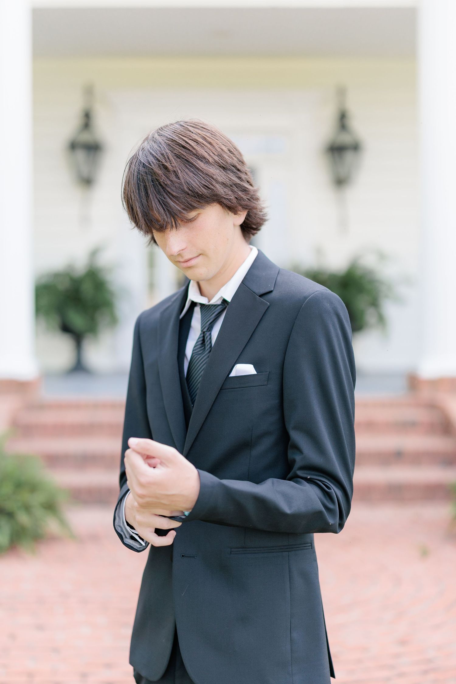 Sharp portrait of a high school guy dressed in a classic prom attire, taken by a photographer based in Valdosta, GA.
