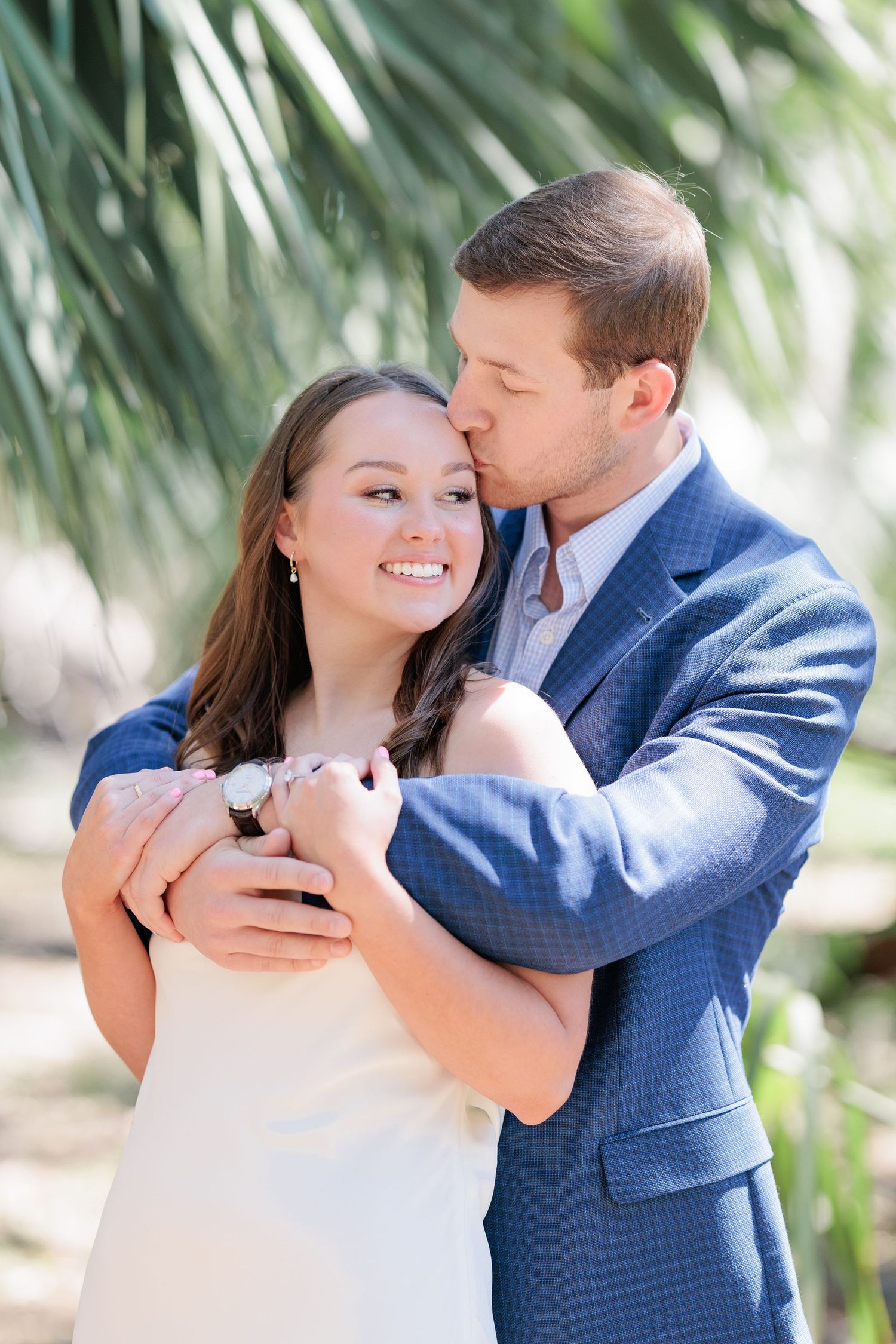 Authentic, joyful engagement portrait of a couple laughing together during an engagement session with photographer based in Valdosta, GA.