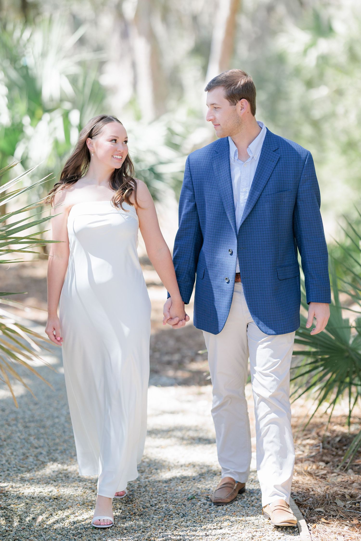 Authentic, joyful engagement portrait of a couple laughing together during an engagement session with photographer based in Valdosta, GA.