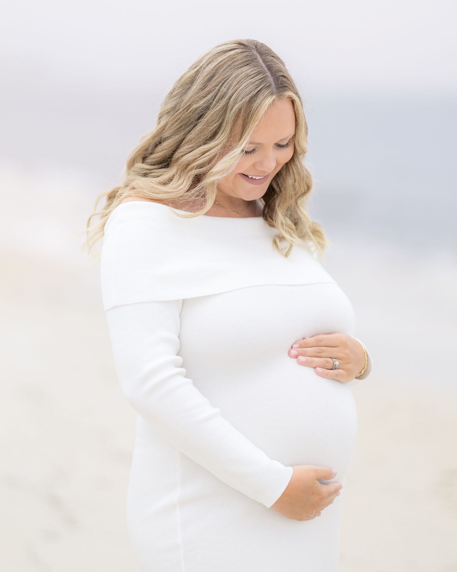 Image of couple celebrating their maternity journey and looking forward to meeting their little one with a photographer in South Georgia.
