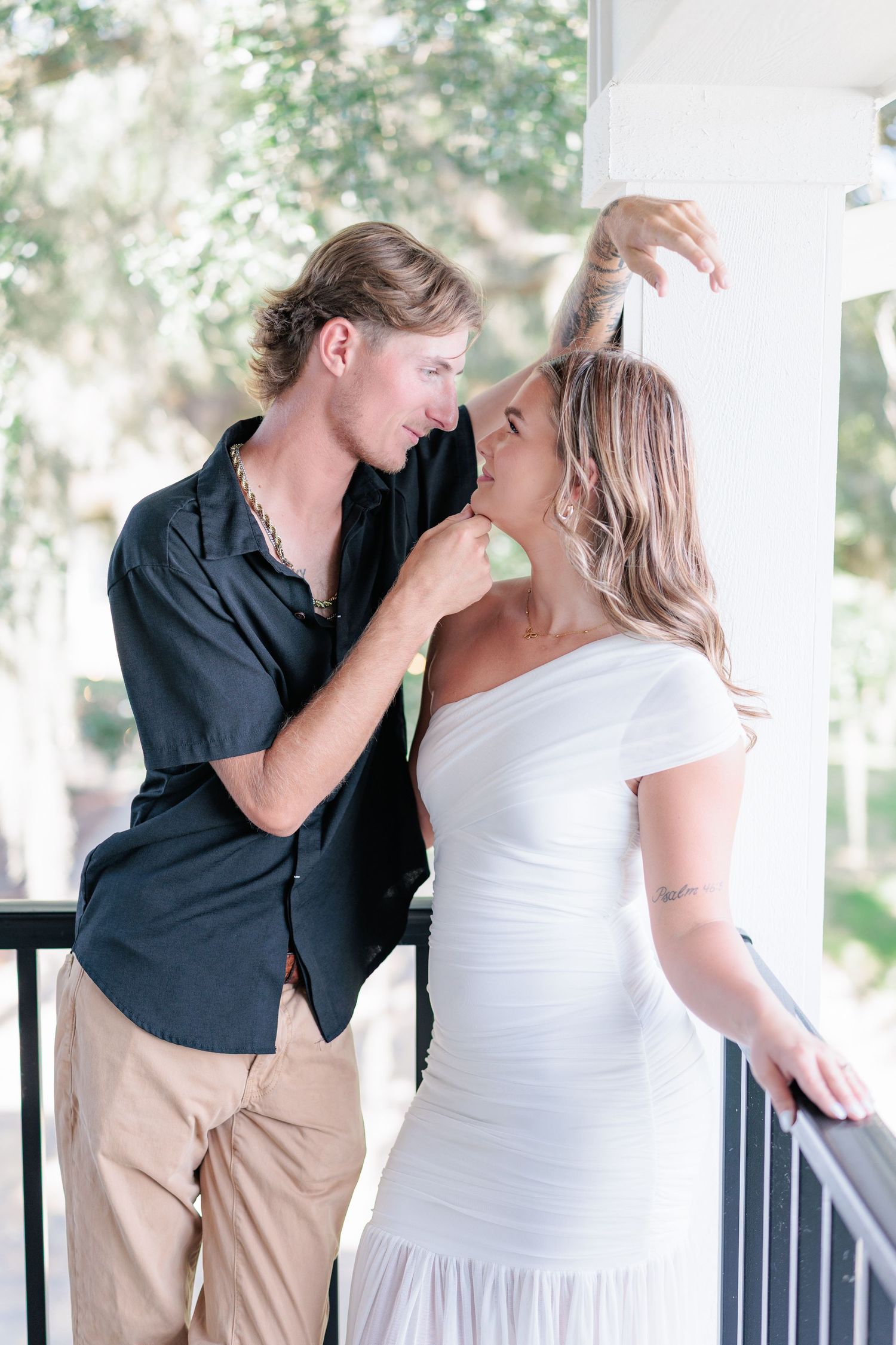 Authentic, joyful engagement portrait of a couple laughing together during an engagement session with photographer based in Valdosta, GA.