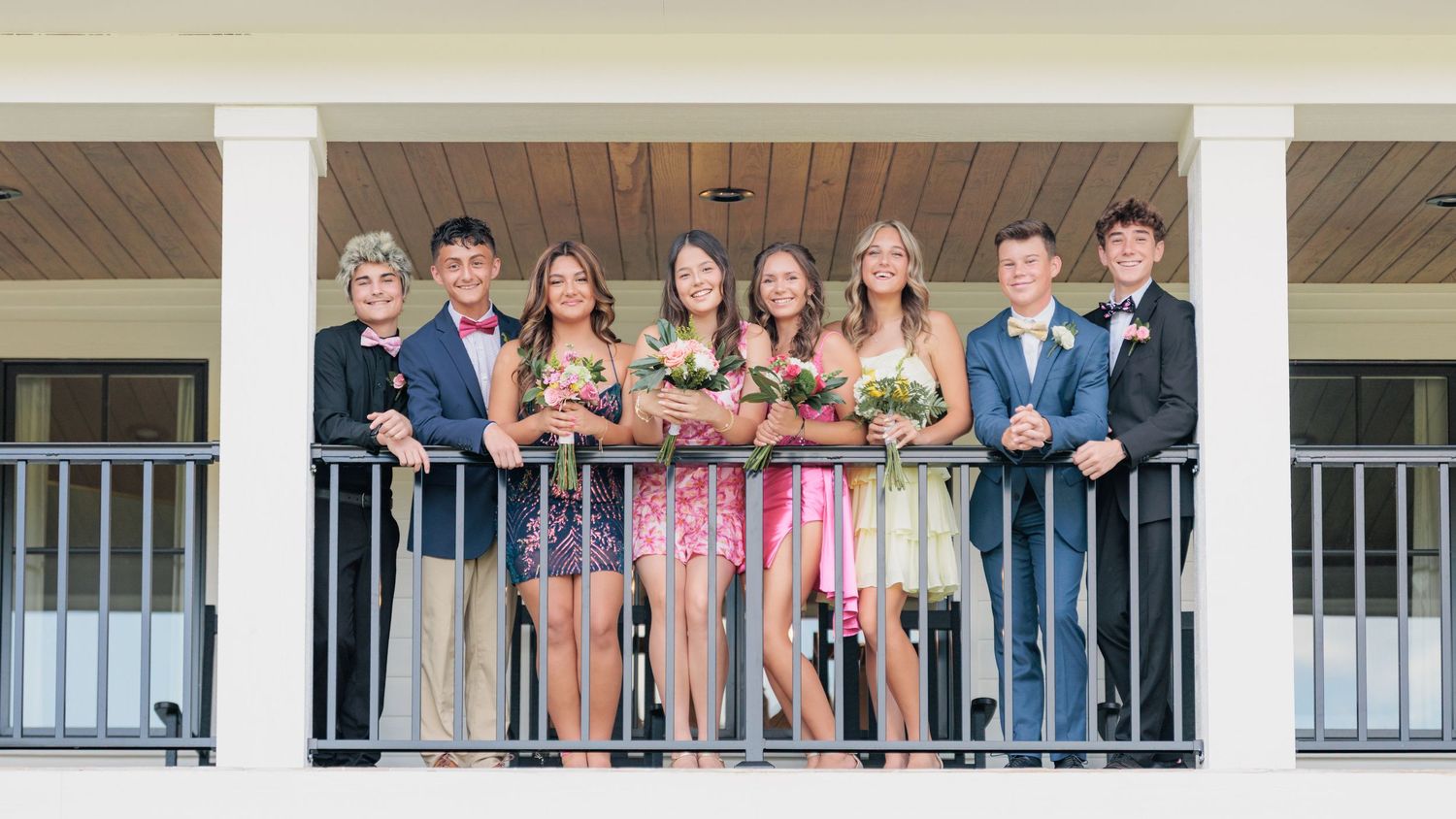 Fun and elegant portrait of a high school prom group dressed up in formalwear in the Valdosta South Georgia area.