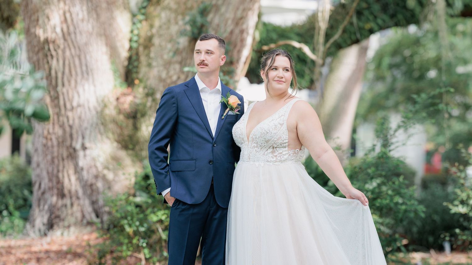 Portrait of a bride and groom embracing during a romantic couple's session during their wedding day in South Georgia.