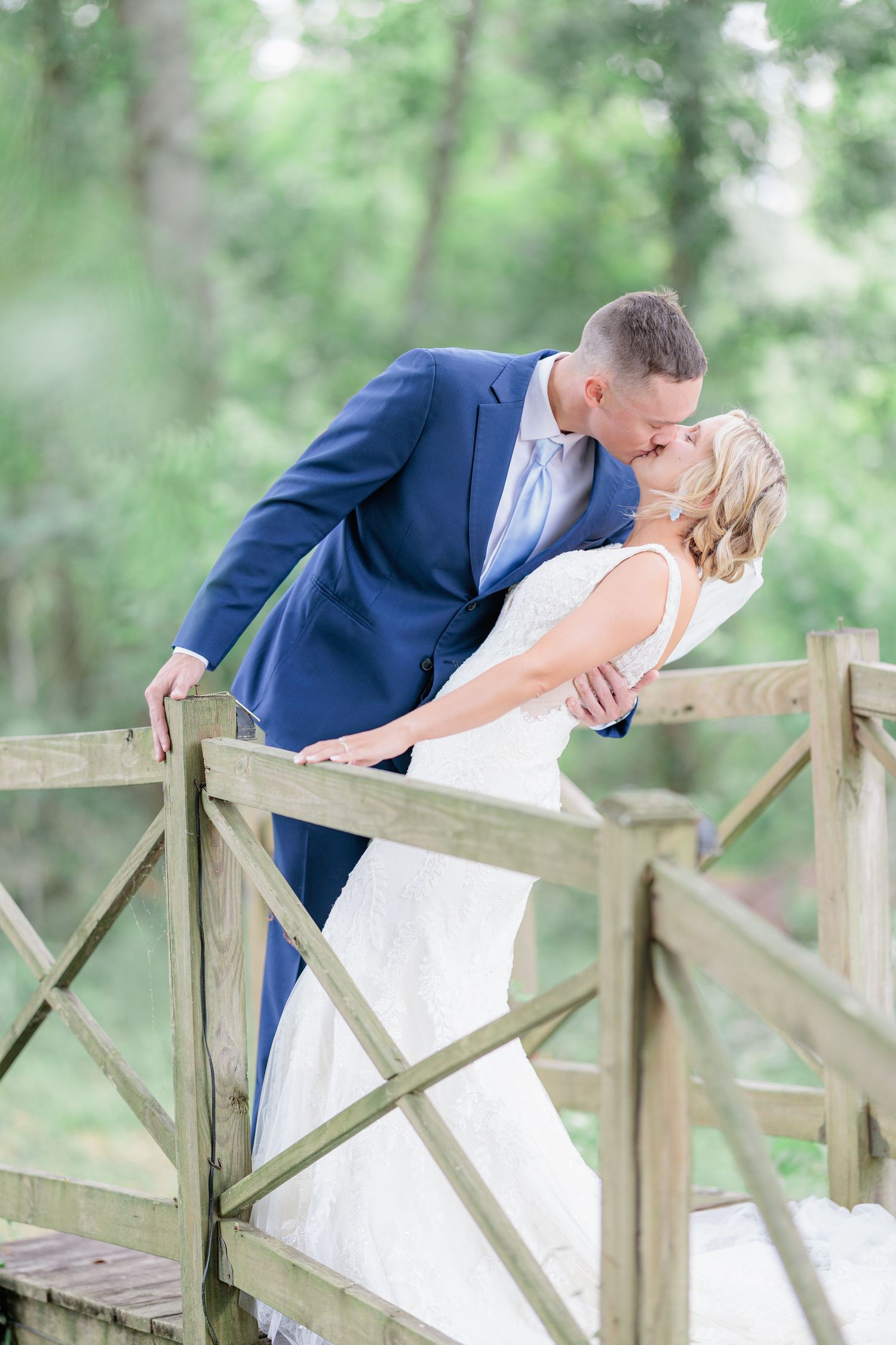 Portrait of a bride and groom embracing during a romantic couple's portrait session during their wedding day in South Georgia.