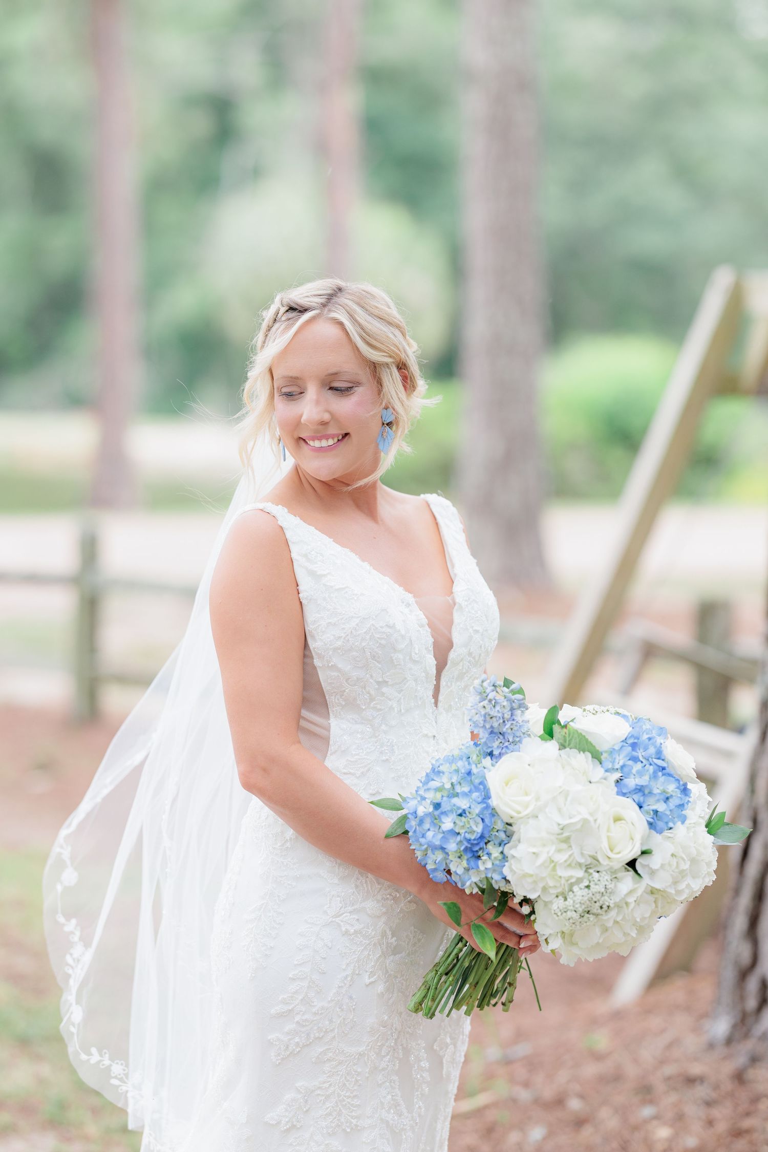 Elegant bridal portrait highlighting the lace details of the wedding dress taken by a South Georgia wedding photographer.