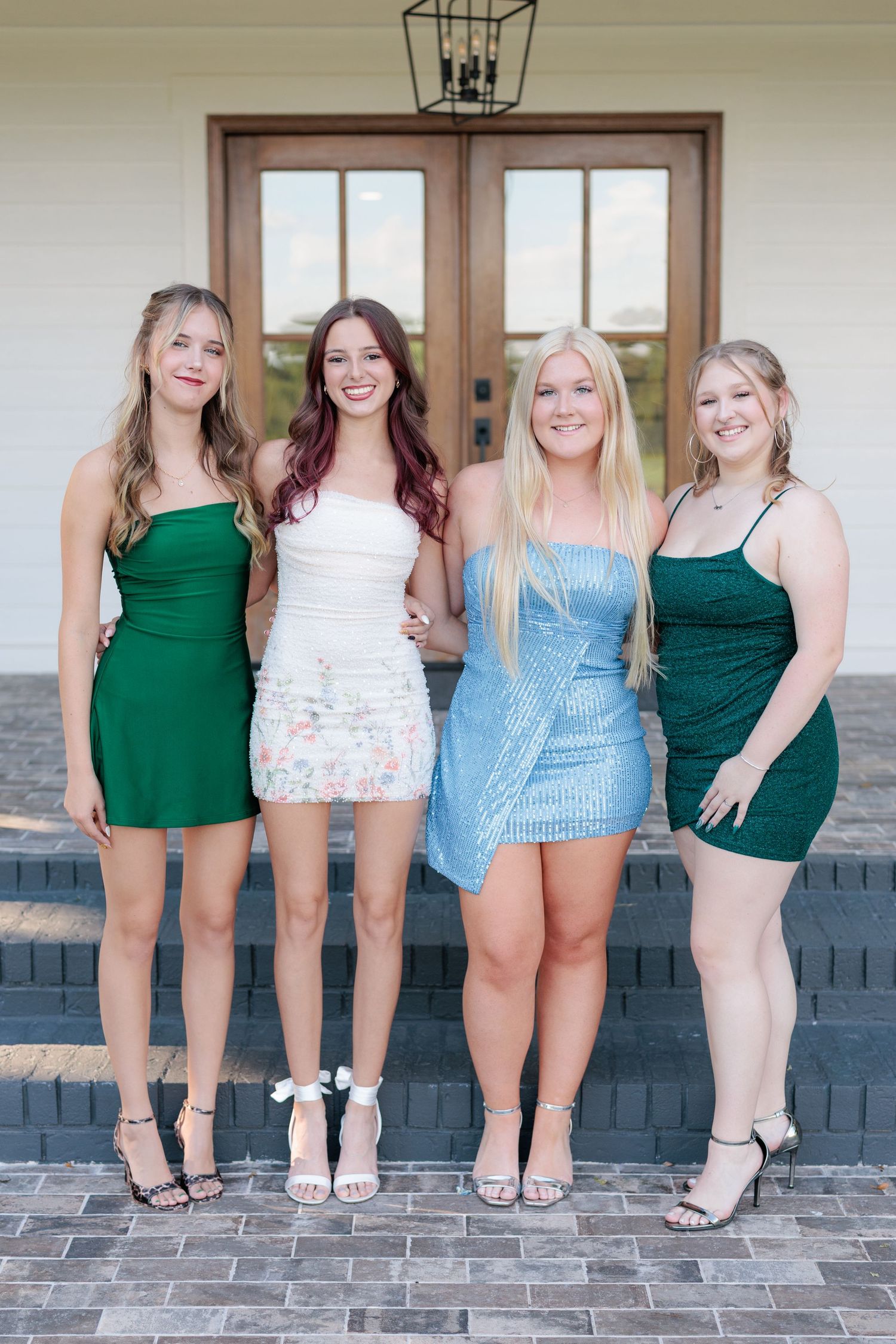 Fun and elegant portrait of a high school prom group dressed up in formalwear in the Valdosta South Georgia area.