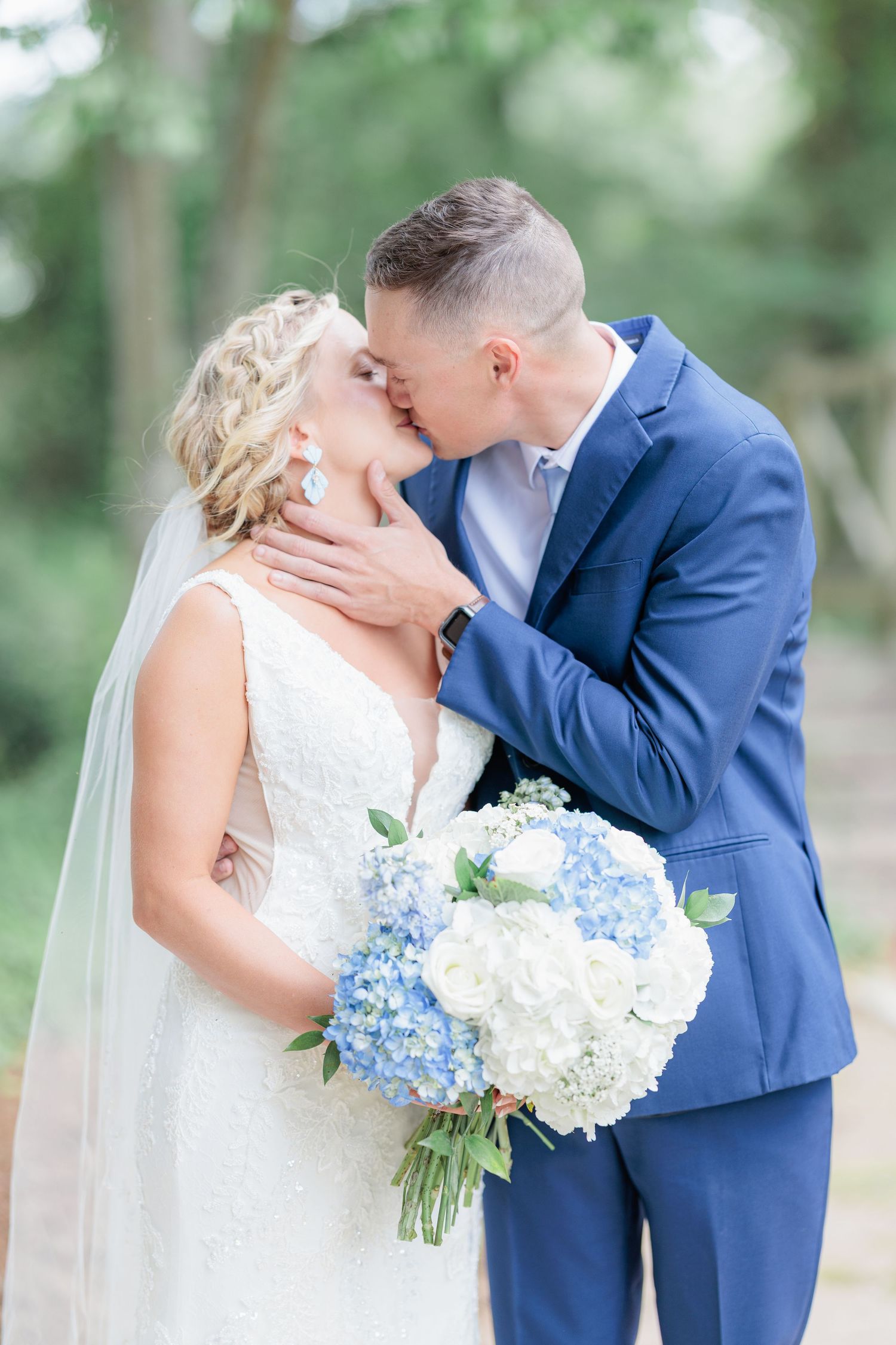 Portrait of a bride and groom embracing during a romantic couple's session during their wedding day in South Georgia.