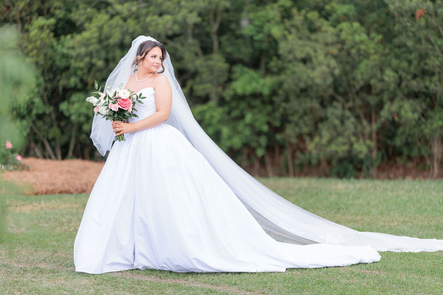 Elegant bridal portrait highlighting the bridal details of the wedding dress at a beautiful with a photographer based in South Georgia.