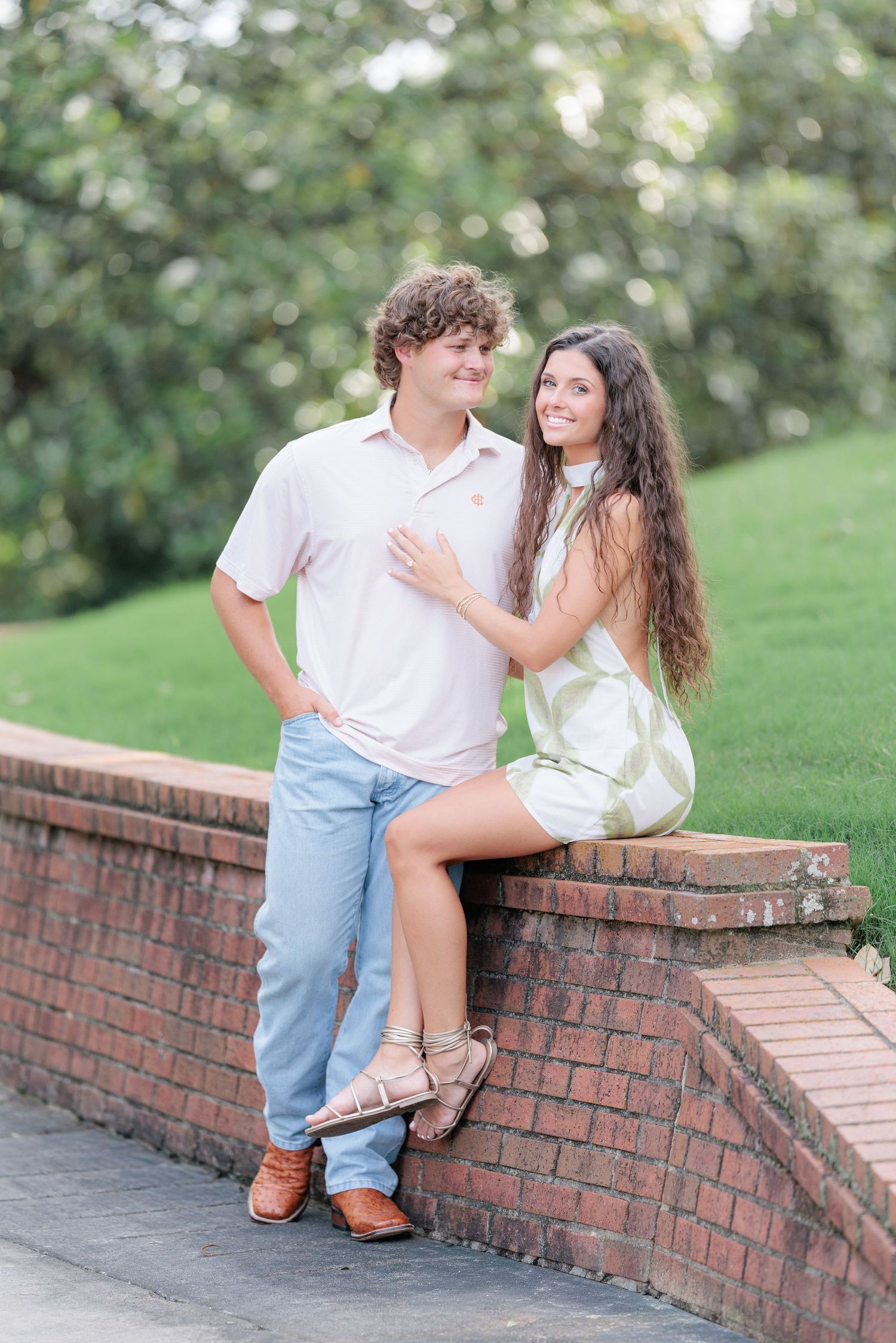 Authentic, joyful engagement portrait of a couple laughing together during an engagement session with photographer based in Valdosta, GA.