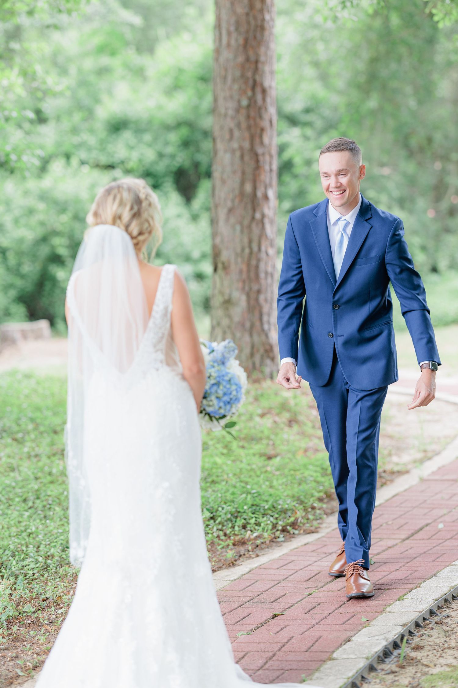 Portrait of a bride and groom embracing during a romantic couple's session during their wedding day in South Georgia.