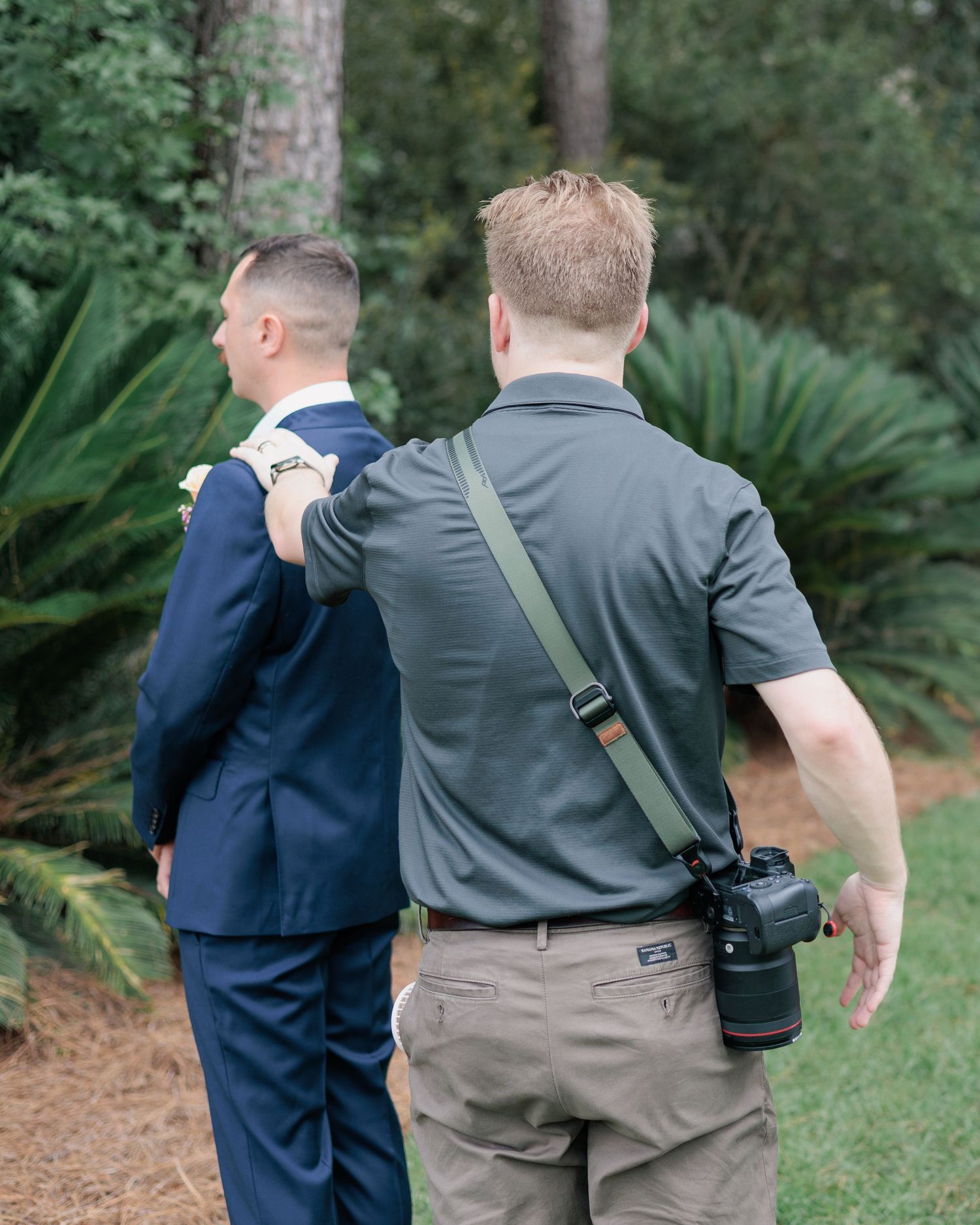 Portrait of Taylor Payne working at photographing a wedding. Photographer based out of Valdosta, Georgia. Services South Georgia.