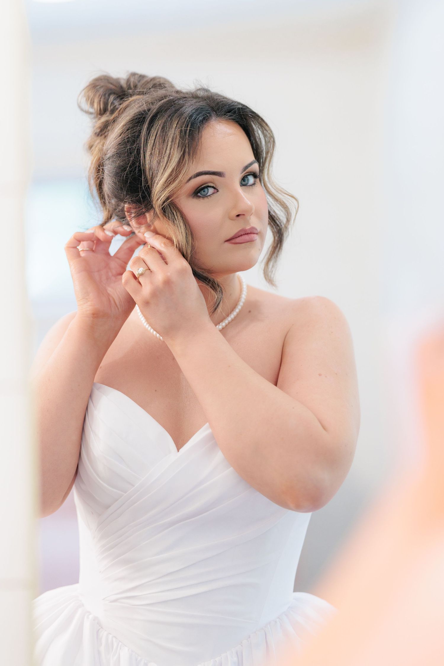 Elegant bridal portrait highlighting the bridal details of the wedding dress at a beautiful with a photographer based in South Georgia.
