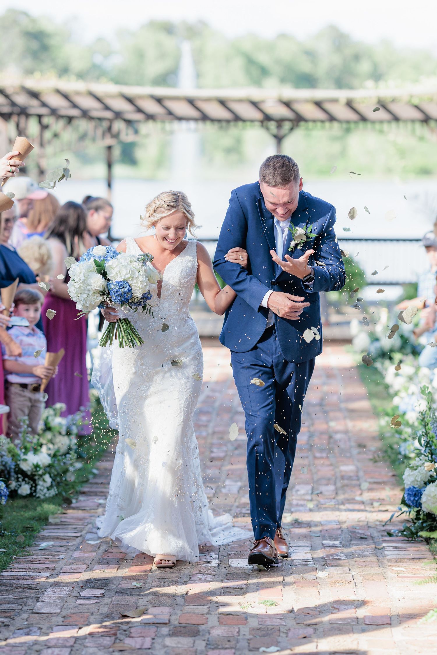 Portrait of a bride and groom embracing during a romantic couple's session during their wedding day in South Georgia.