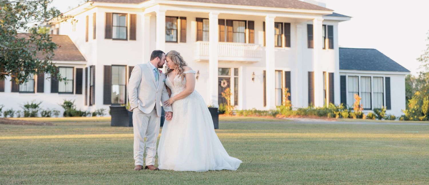 Candid portrait of a bride and groom embracing during a romantic sunset session by a wedding photographer in South Georgia.