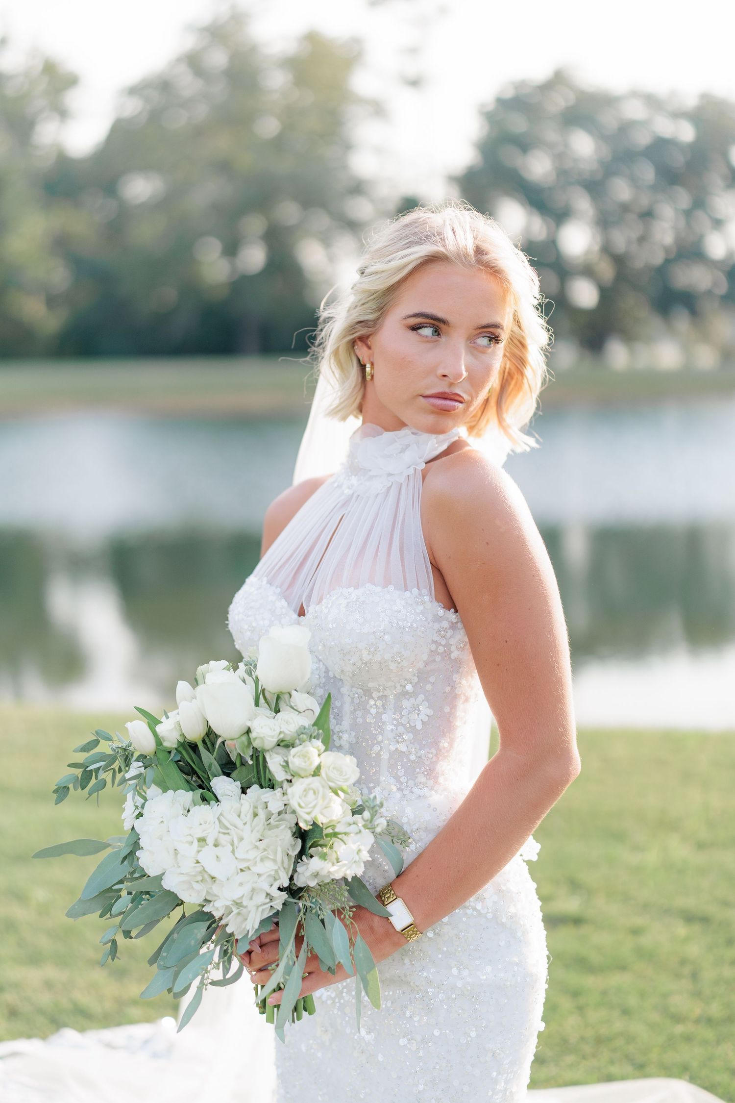 Elegant bridal portrait highlighting the bridal details of the wedding dress at a beautiful with a photographer based in South Georgia.
