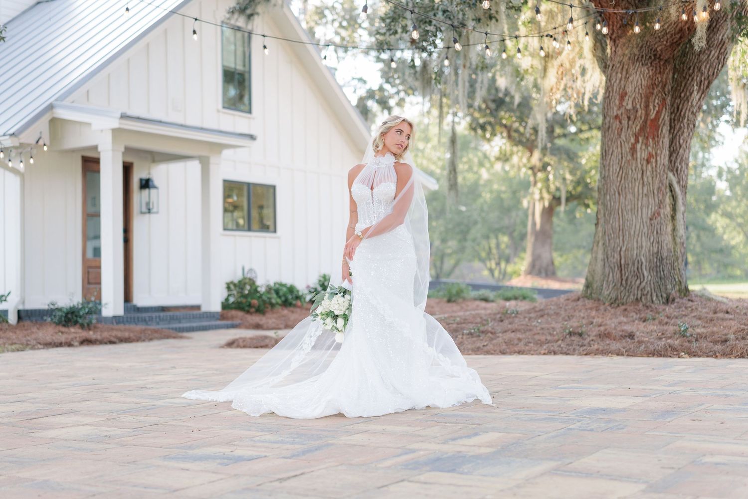 Elegant bridal portrait highlighting the bridal details of the wedding dress at a beautiful with a photographer based in South Georgia.