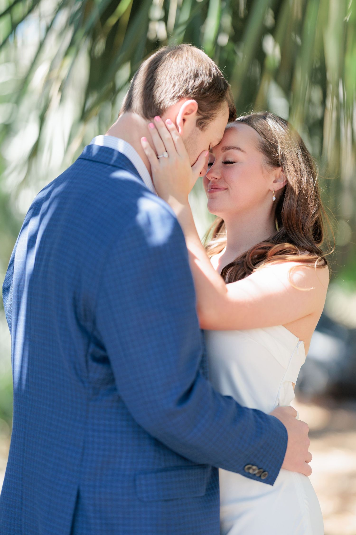 Authentic, joyful engagement portrait of a couple laughing together during an engagement session with photographer based in Valdosta, GA.