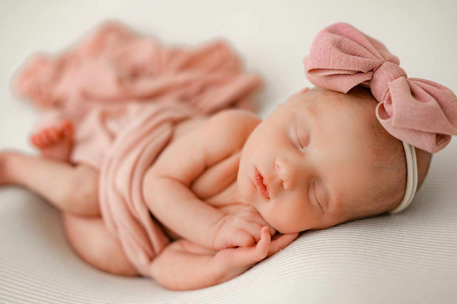 Newborn sleeping posed during newborn session in Fulshear TX