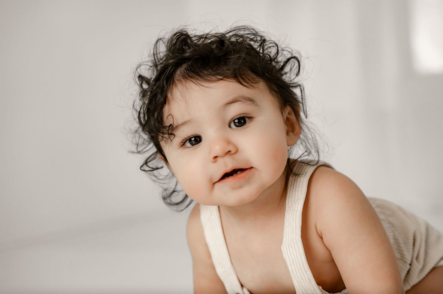 One year portrait of baby boy during his studio session Fulshear, TX.