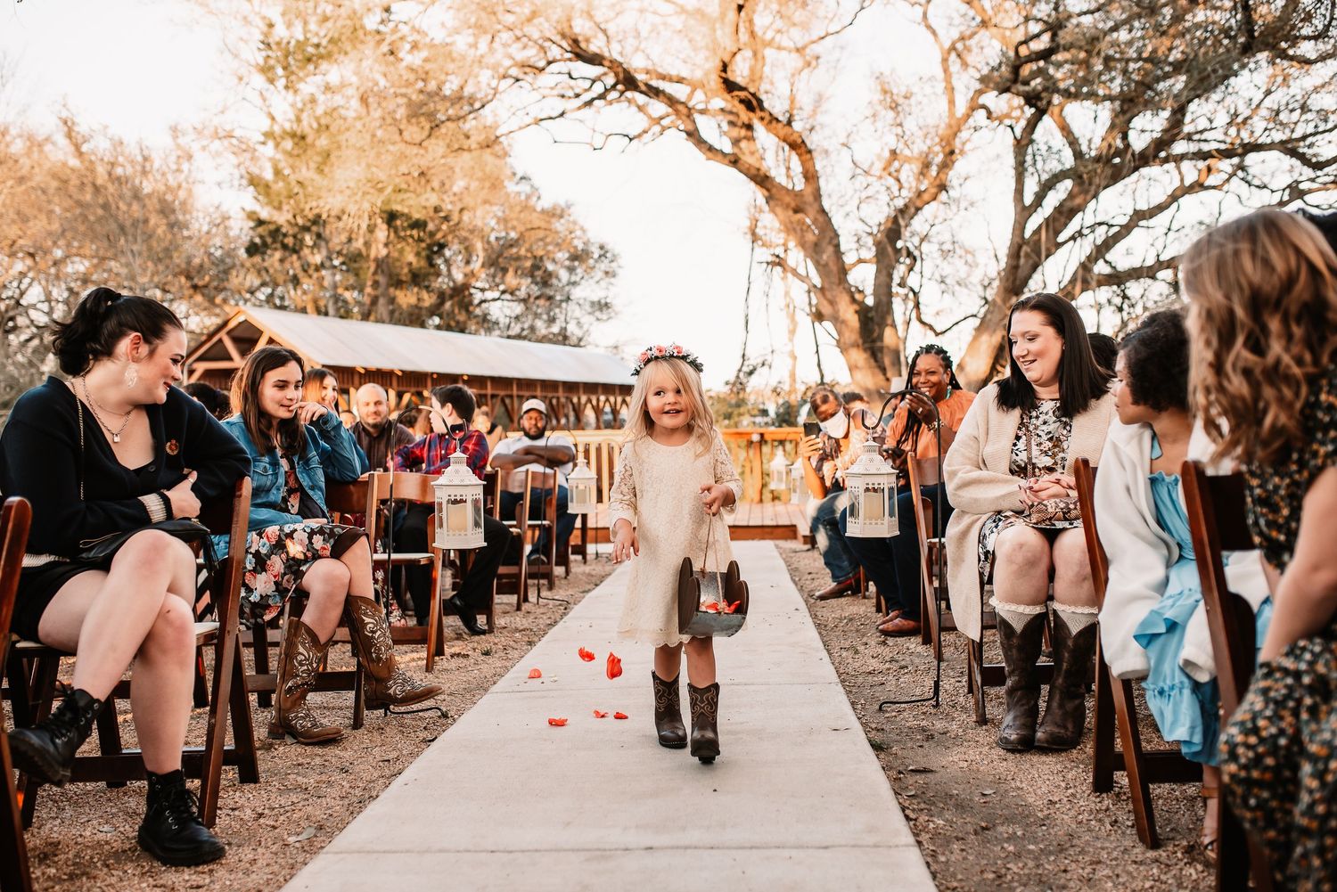 Houston wedding photography by Kara & Barb- flower girl walking down the isle
