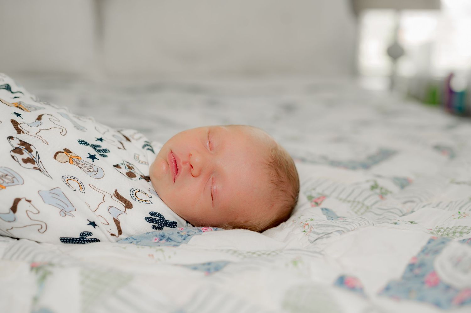 Lifestyle newborn session with a Sleeping baby in Katy TX