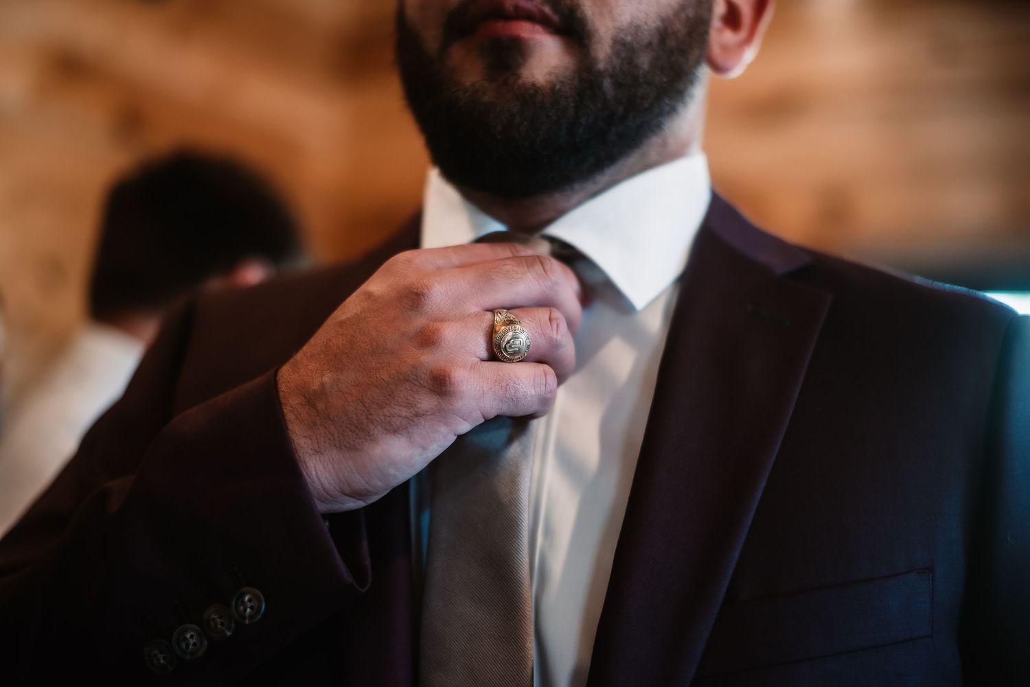 Houston wedding photography detail groom adjusting tie