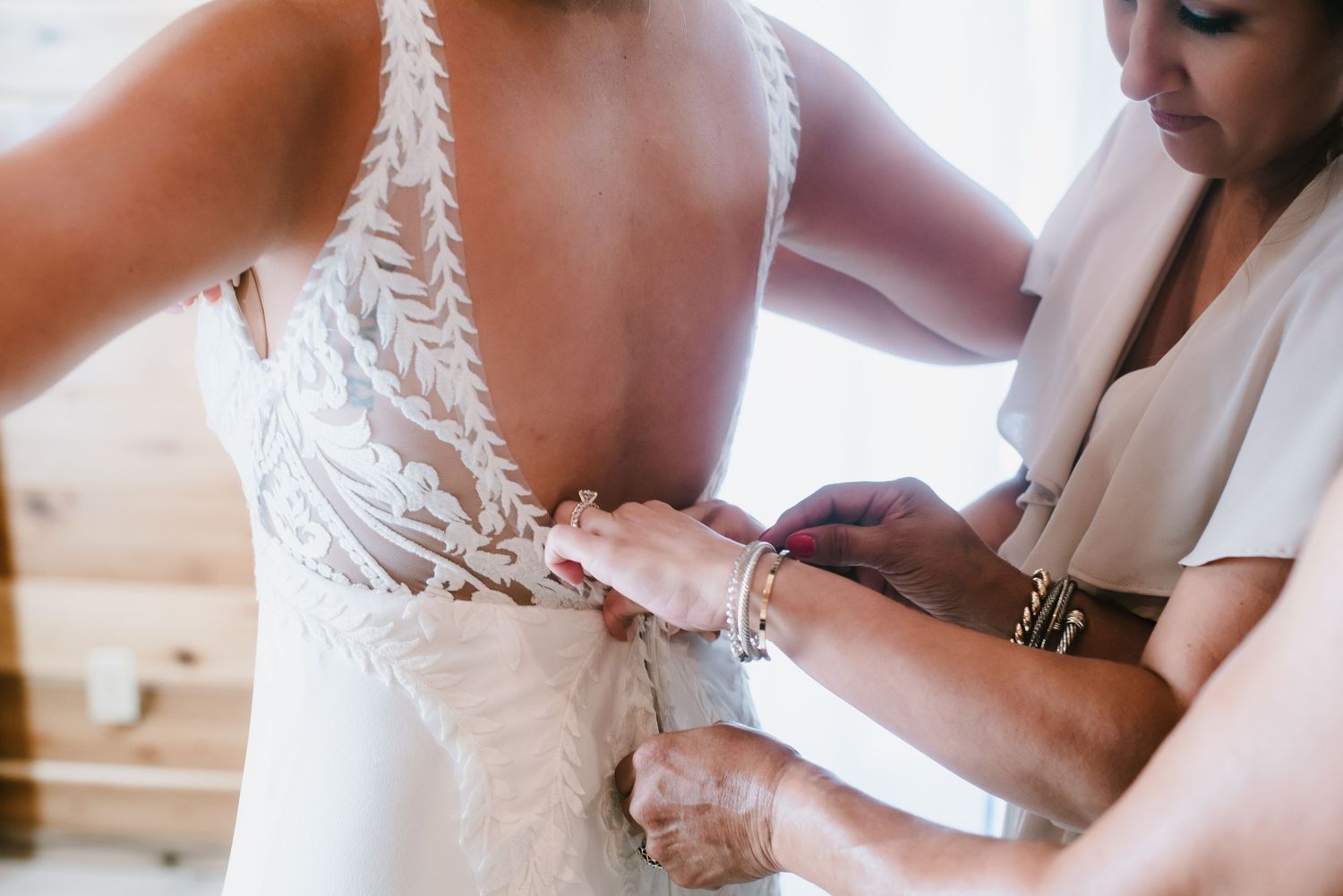 Bride getting ready Houston wedding photography by Kara & Barb