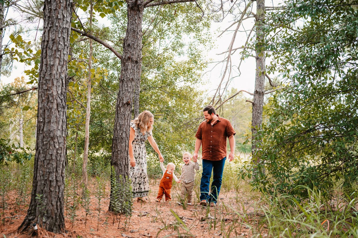 Family walking together during outdoor session Katy, TX