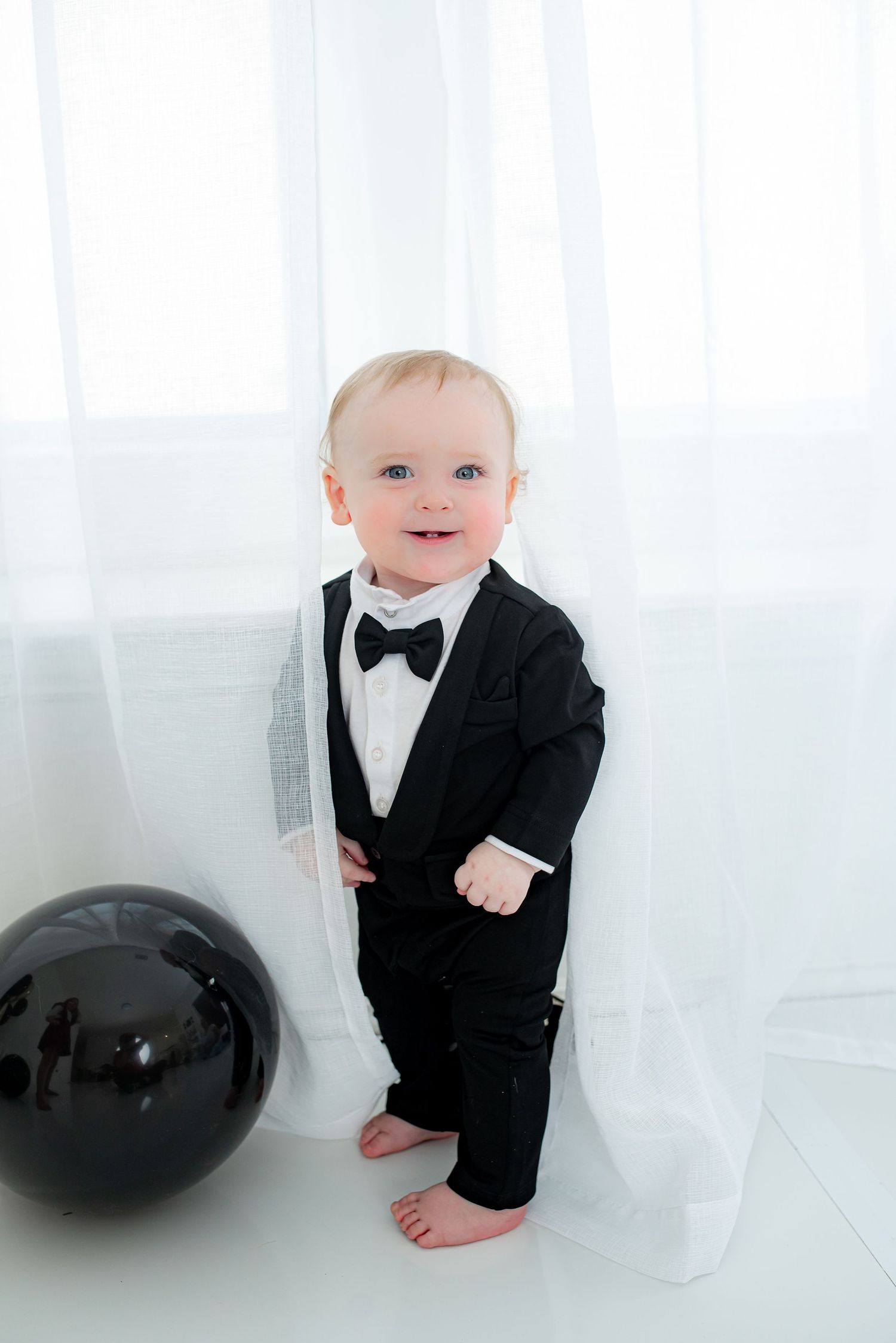 Timeless first birthday milestone photography session in Katy, TX.