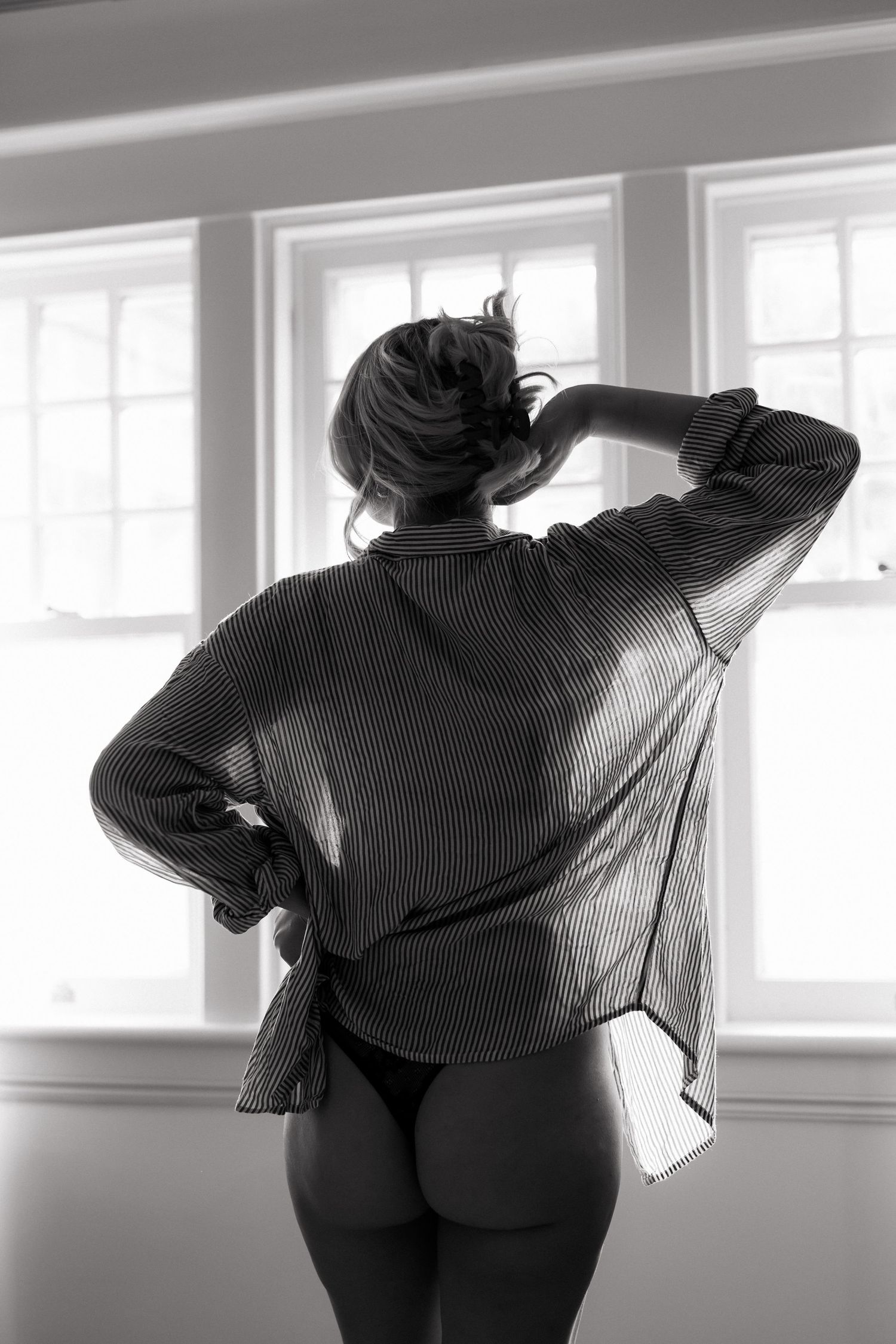 Grimsby Photographer. In studio boudoir photo session. Cozy girl lifestyle boudoir
