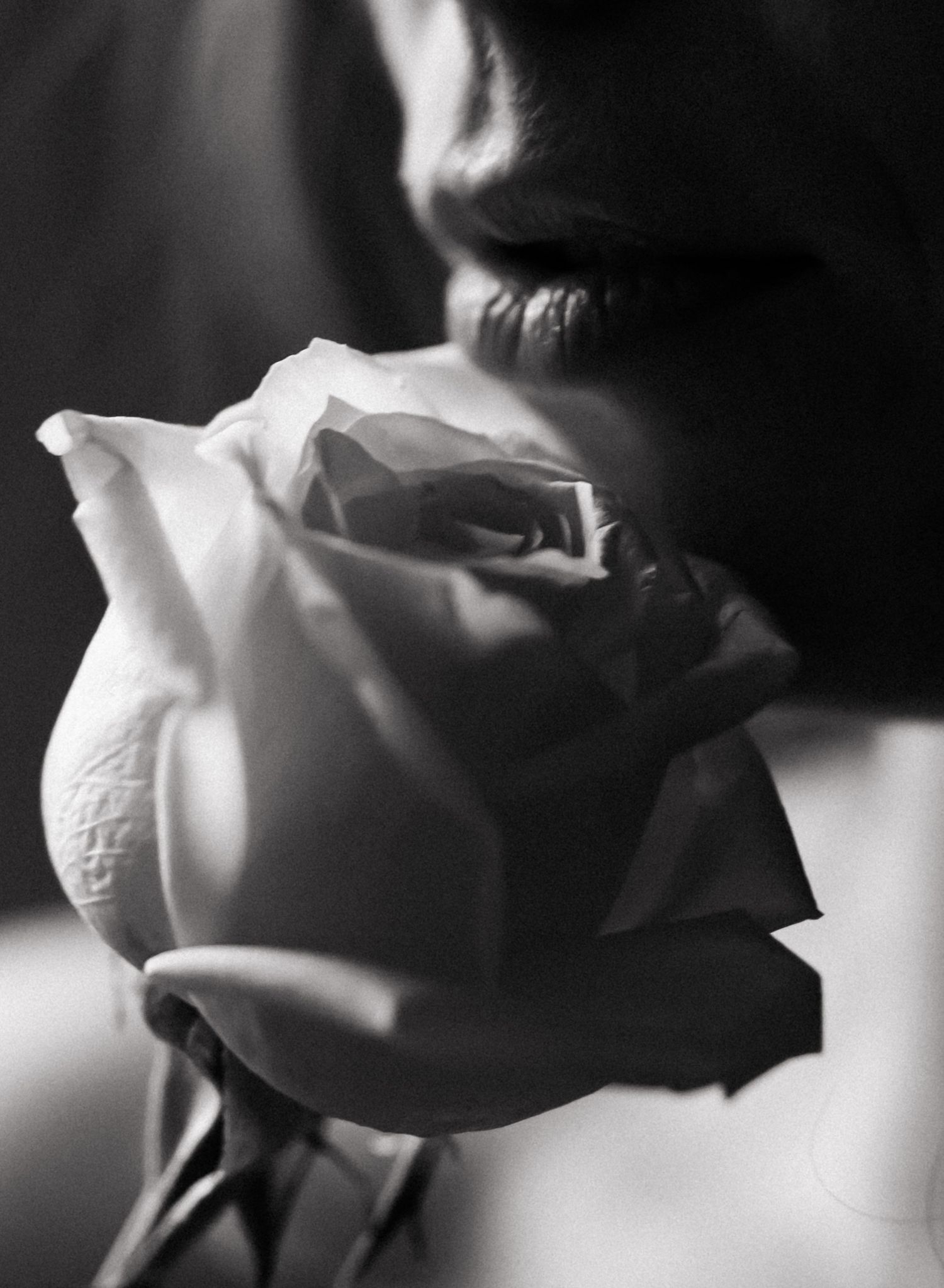 Grimsby Photographer. In studio boudoir photo session. Moody black & white.