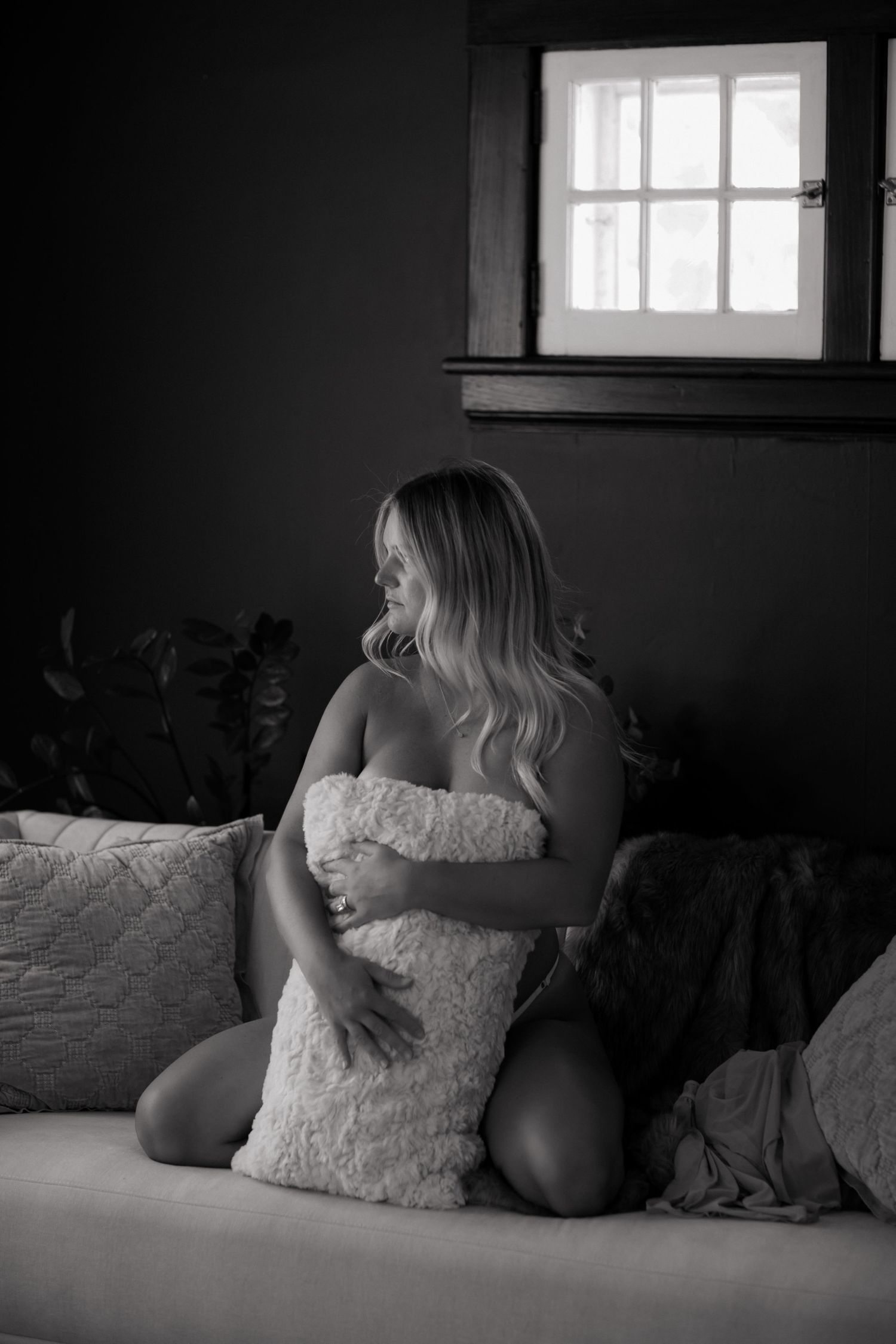 Grimsby Photographer. In studio boudoir photo session. Moody black & white.